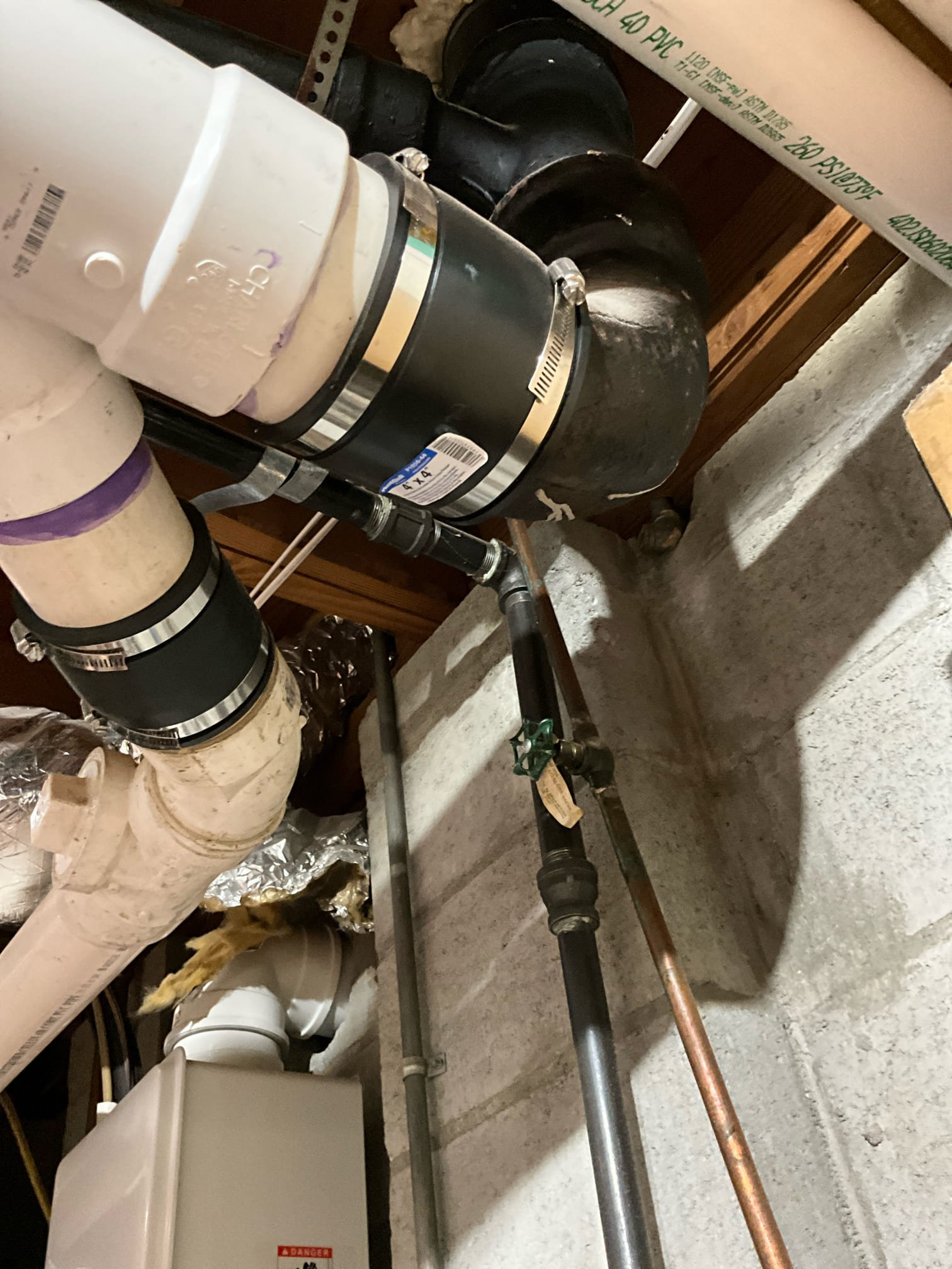 Call to check recent plumbing drain work.

Arrived and met with Nathan. He had concerns after hearing a gurgling noise in a newly installed shower. 

I checked shower and drains and everything looks okay. Drains are clear, sewer has correct fall, and vent is within 8 feet of trap. 

While on site I also found that the tankless water heater has a leaking heat exchanger. We are scheduling to return Thursday to replace the unit. 