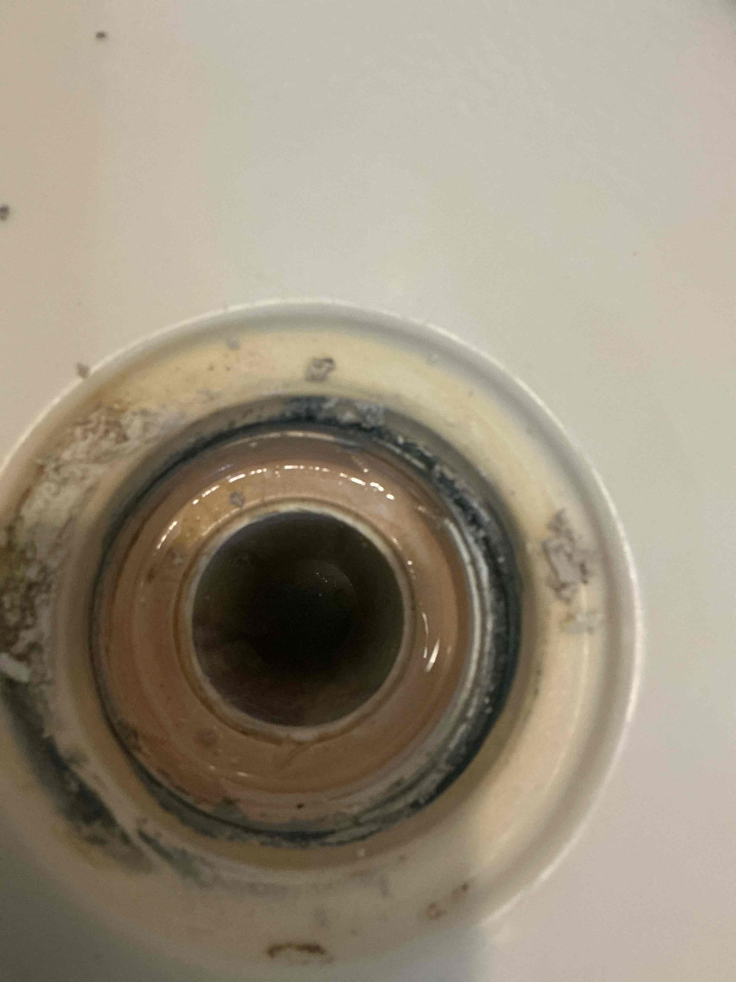 Found hair line cracks in drain for master restroom shower.