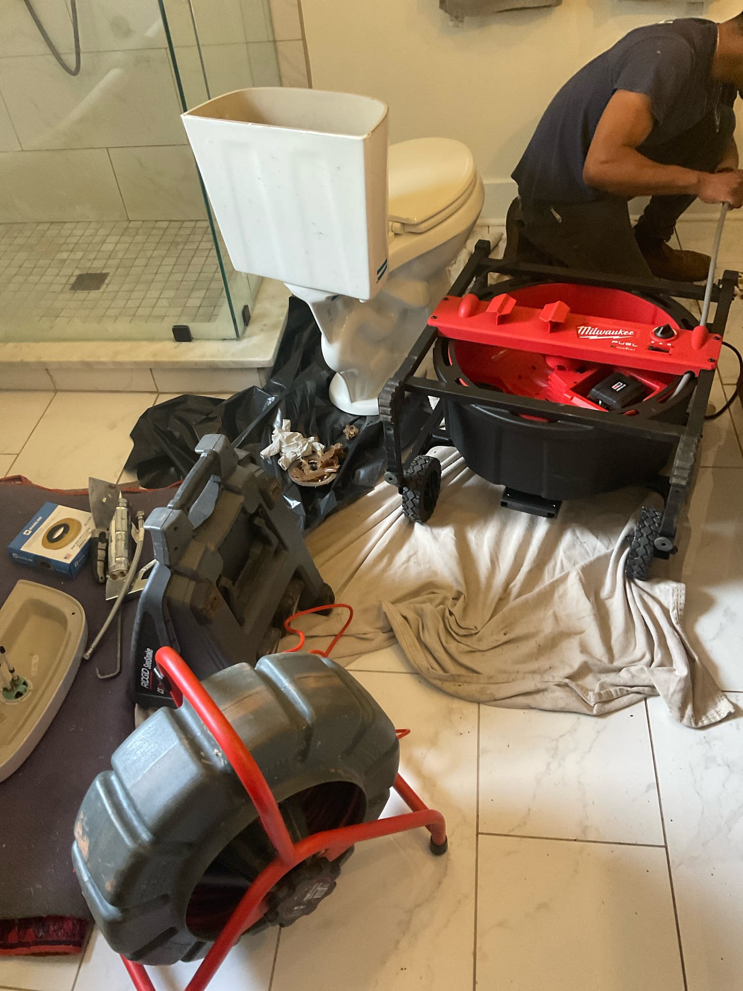 Today we found problem with back up main sewer line and caused both toilet gurgling , we removed and reset toilet , snake , camera , located problem outside  , 