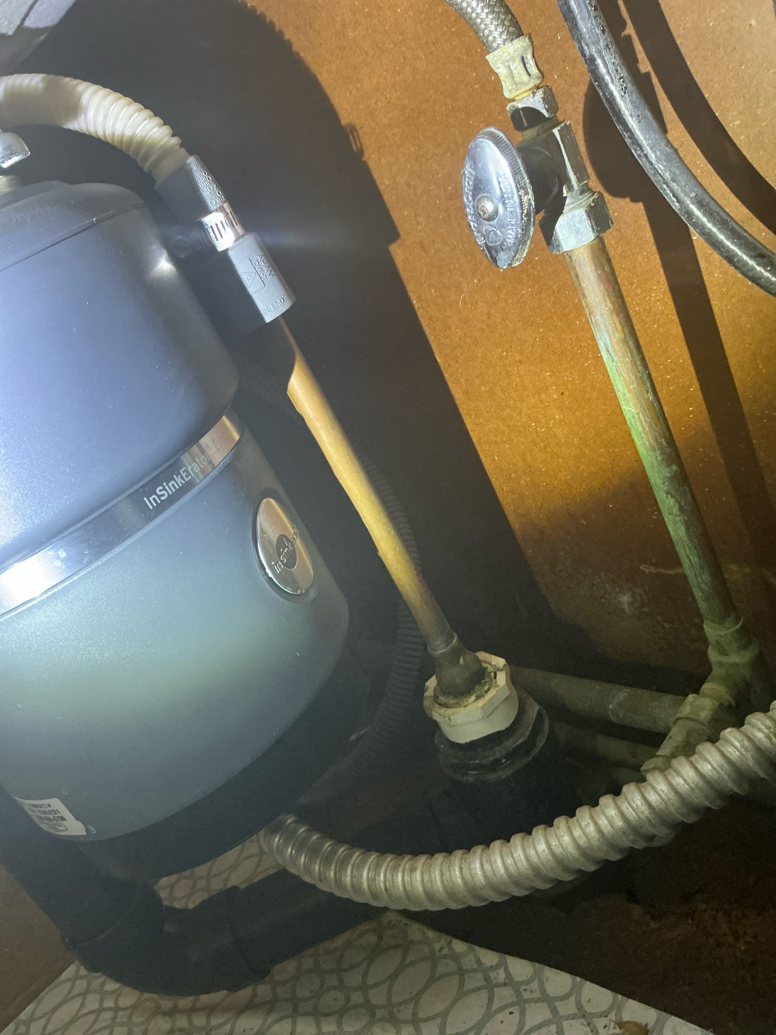 Client called us out due to a leak beneath the kitchen sink that soaked the cabinet and leaked down below into the basement. Discovered it was the side sprayer nozzle leaking at the hose connection when water was on to the faucet. We replaced that faulty kitchen faucet with new moen customer supplied faucet that we picked up from Home Depot and installed. Tested all connections, no leaks. 

1 yr labor warranty