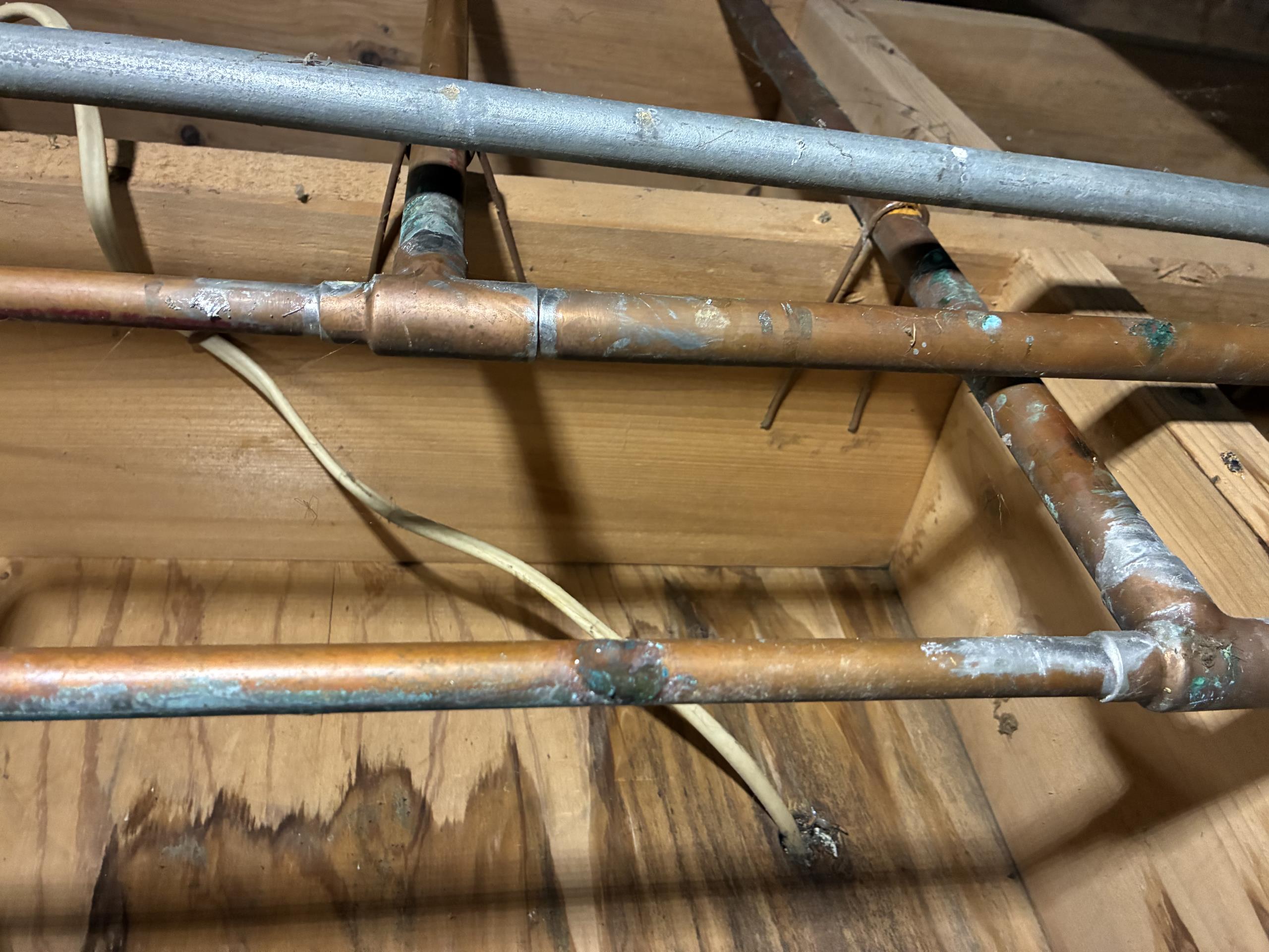 Call for sewer cable stuck in clean out, and backed up sewer main.

Arrived and met with Bud. He explained that he was trying to get the sewer line cleared and his cable bound up, and became stuck in the clean out. 

I asked about the history of the home, and Bud mentioned that the main has been replaced with pvc to replace terra cotta pipes. A few years after the replacement he started having issues again. Once I ran the hydrojet and was able to get the camera in I found that there is still 10-15 feet of old line towards the city side. Severe root intrusion has led to backups. I ran the jet at each union and cleared the roots. Video before, during, and after shows progress. 

Bud also asked me to check a leak under the home, and I repaired a half inch copper elbow with a pin hole. I also replaced another small section of copper with an active leak during this process.

I discussed options for repair and replacement of sewer line, as well as correcting a water main issue. The home curr