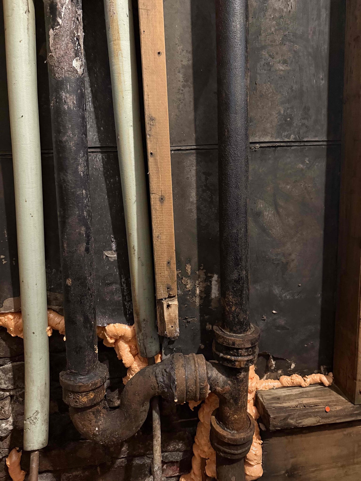 Returned to cut out cast iron laundry p trap and stand pipe all the way to the stack and replace with new pvc. Cut out old cast iron and replaced it with 2 inch pvc. Ran small sewer machine down the line to make sure there was no further blockages. Ran water for 5 minutes down the line to make sure was clear and no longer leaking. Line no longer is backing up and is flowing properly. No leaks upon departure.