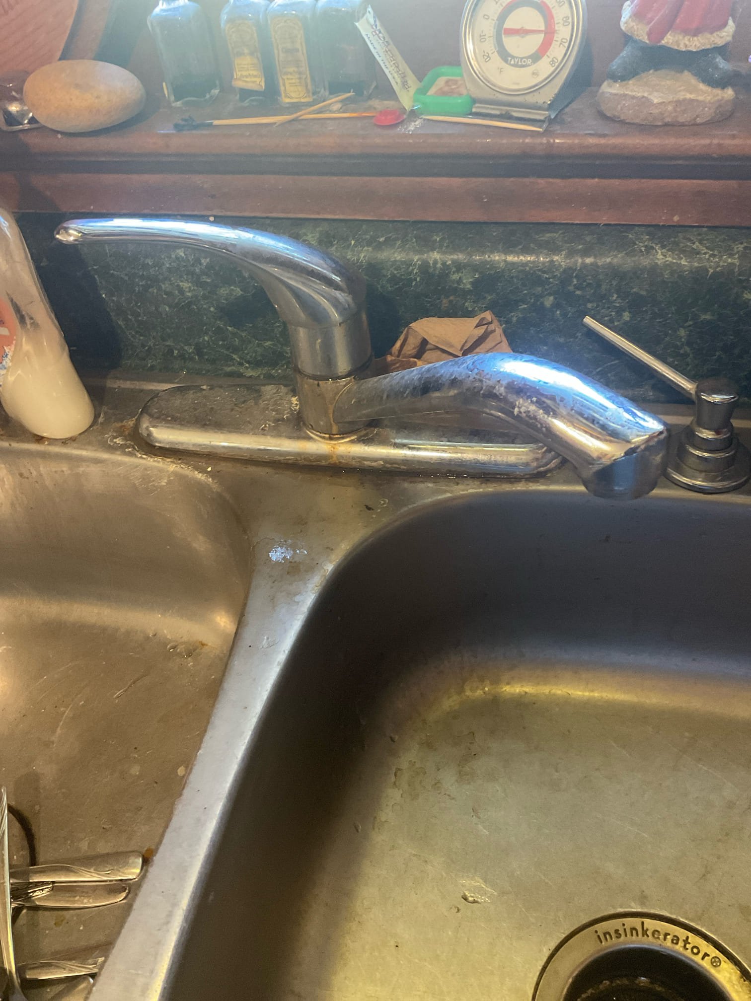 Replaced a old single handle kitchen faucet with customer picked out together at home deport delta single handle faucet , new supply line installed 