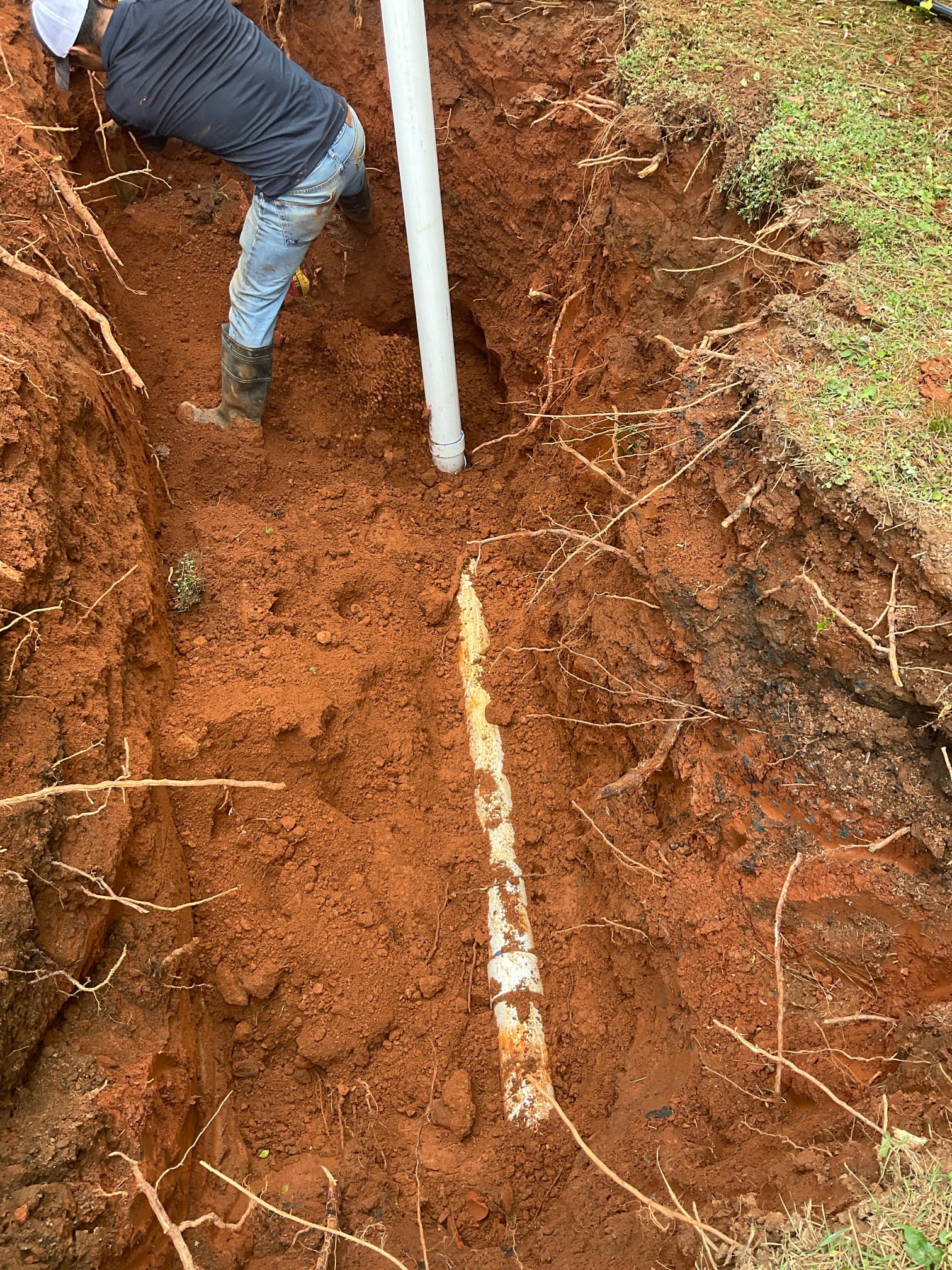 We have problem with main house sewer back up ,have  clean out next to walkway is overflowing after we opened , attempted clear it with chain snake , unfortunately we can’t clear due to problem with pipe , used camera located the problem about 15-20 feet from the street , then today we brought excavator dug down replaced about 10 feet bad pipe was damaged by roots and installed additional clean out . 