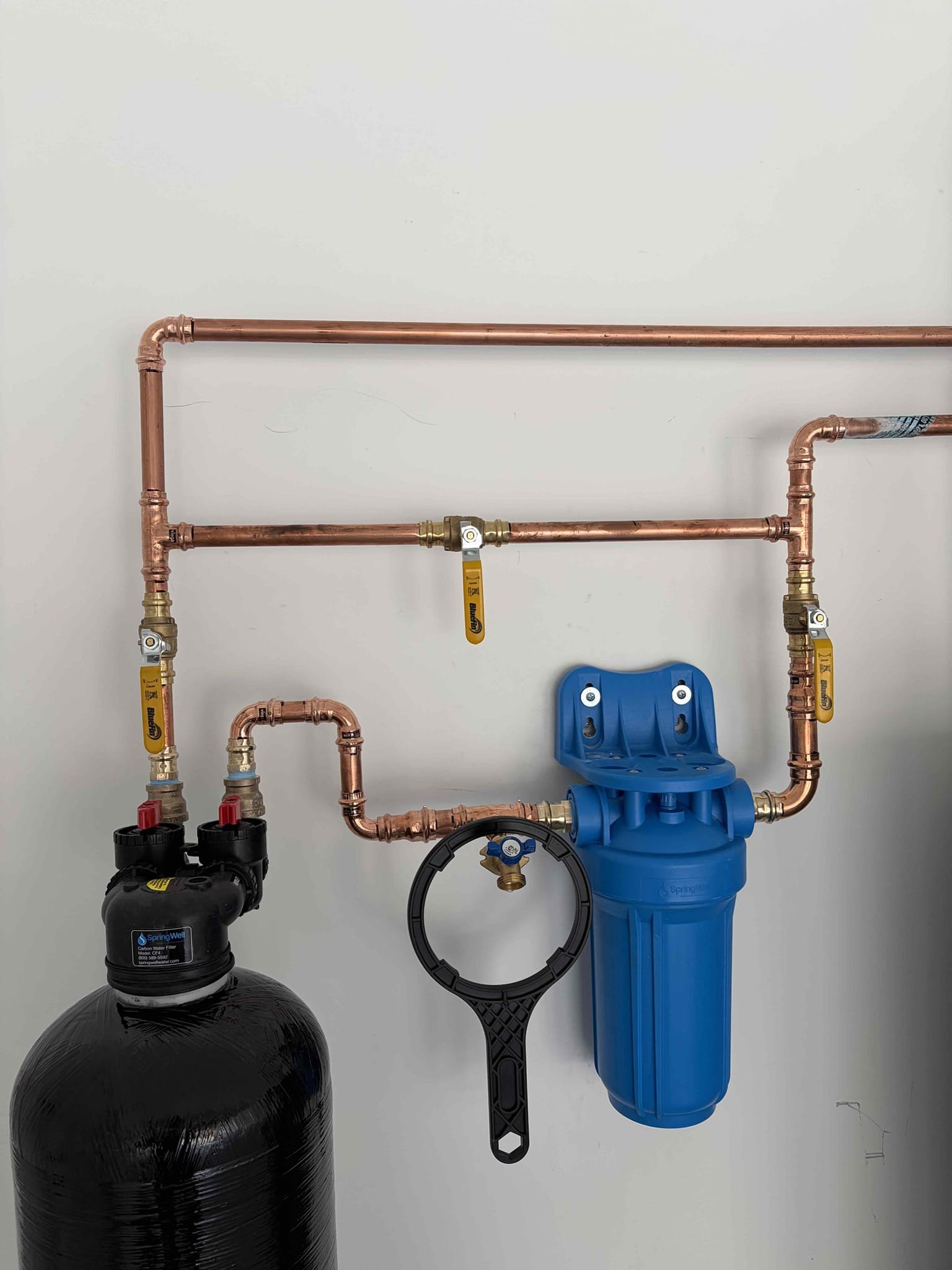 For this customer install a brand new spring well water filter system supplied by the homeowner had to install a bypass system to allow the system to be bypassed. If need be install Auburn brand new copper piping reduce down from 1 inch to three-quarter and plumbed it back into the main water supply made sure that the filter was nice and tight on the head and for the post filter everything should be working properly. The customer did a 48 hour flush beforehand to make sure everything was rocking and Rolling. Once the filters have been installed along with all the pipes. There are no leaks in the customer is all set to use the brand new filter for their home.