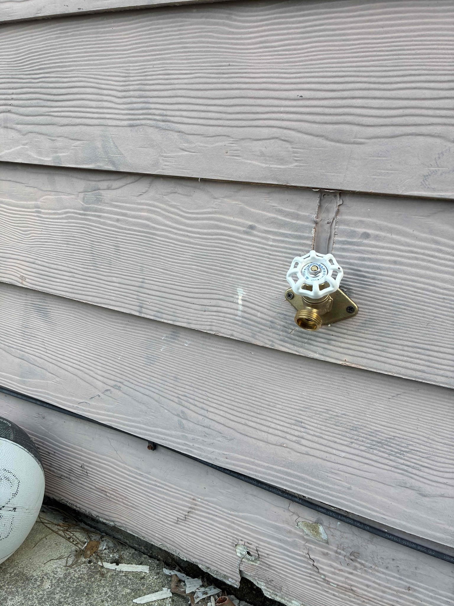 Shut off water to home and drain system. Cut out and replace section of ruptured pipe and old hose spicket. Install new hose spicket and section of pipe. Test for proper operation. Told customer will replace shut off valve if necessary. Shut off is good ball valve and not in need of replacing. Tested all work and no leaks found after work completed 