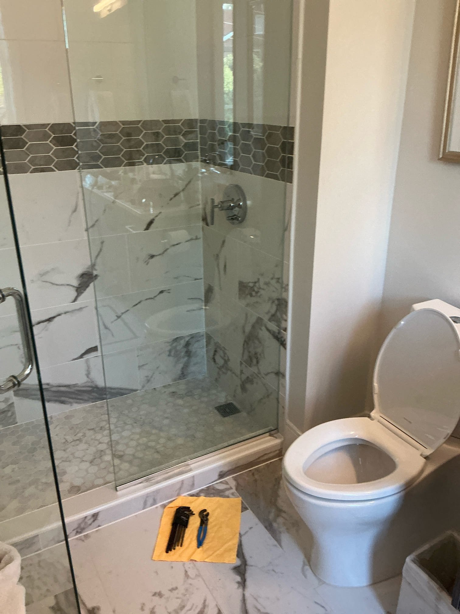 Found shower in guest restroom with low volume. Removed shower head and cleaned mineral buildup out. Reinstalled shower head and tested. No other issues at this time.