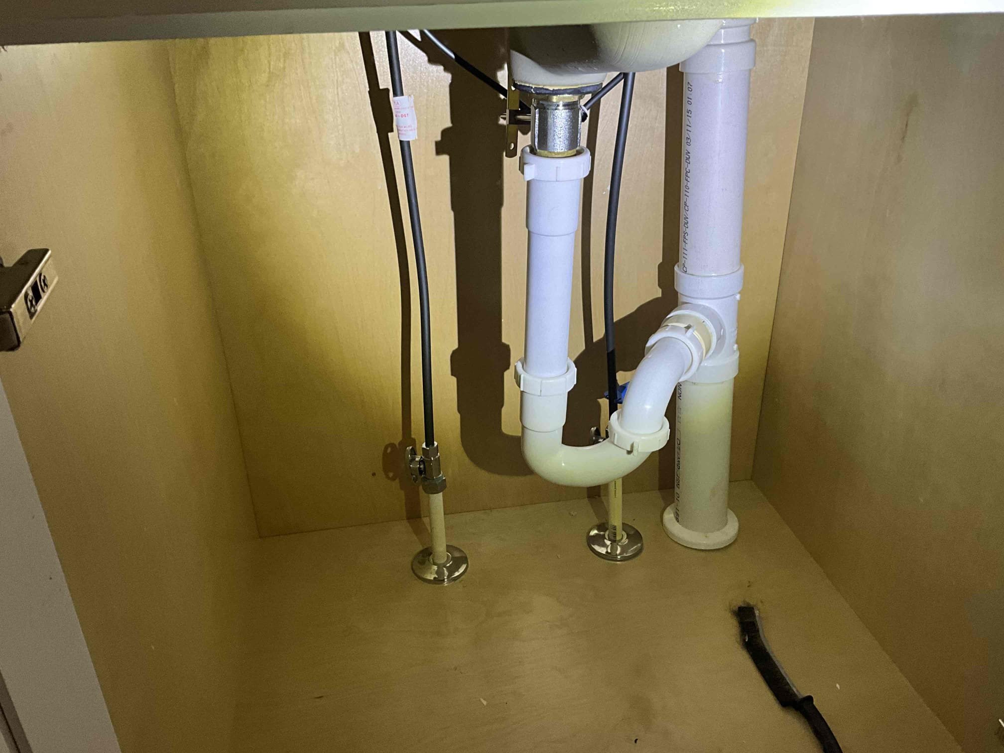 Performed thorough evaluation of the home. Found leaks on multiple faucets including the main kitchen faucet, the downstairs lavatory faucet, the right hand sink on the main floor in the primary bath, and one left hand lavatory faucet including the upstairs bathroom. Water heater is 10 years old and is at recommended replacement. The garbage disposal is running poorly and shows heavy rust on the platform for the blades. Recommended having a reliable water shutoff for the whole home. 