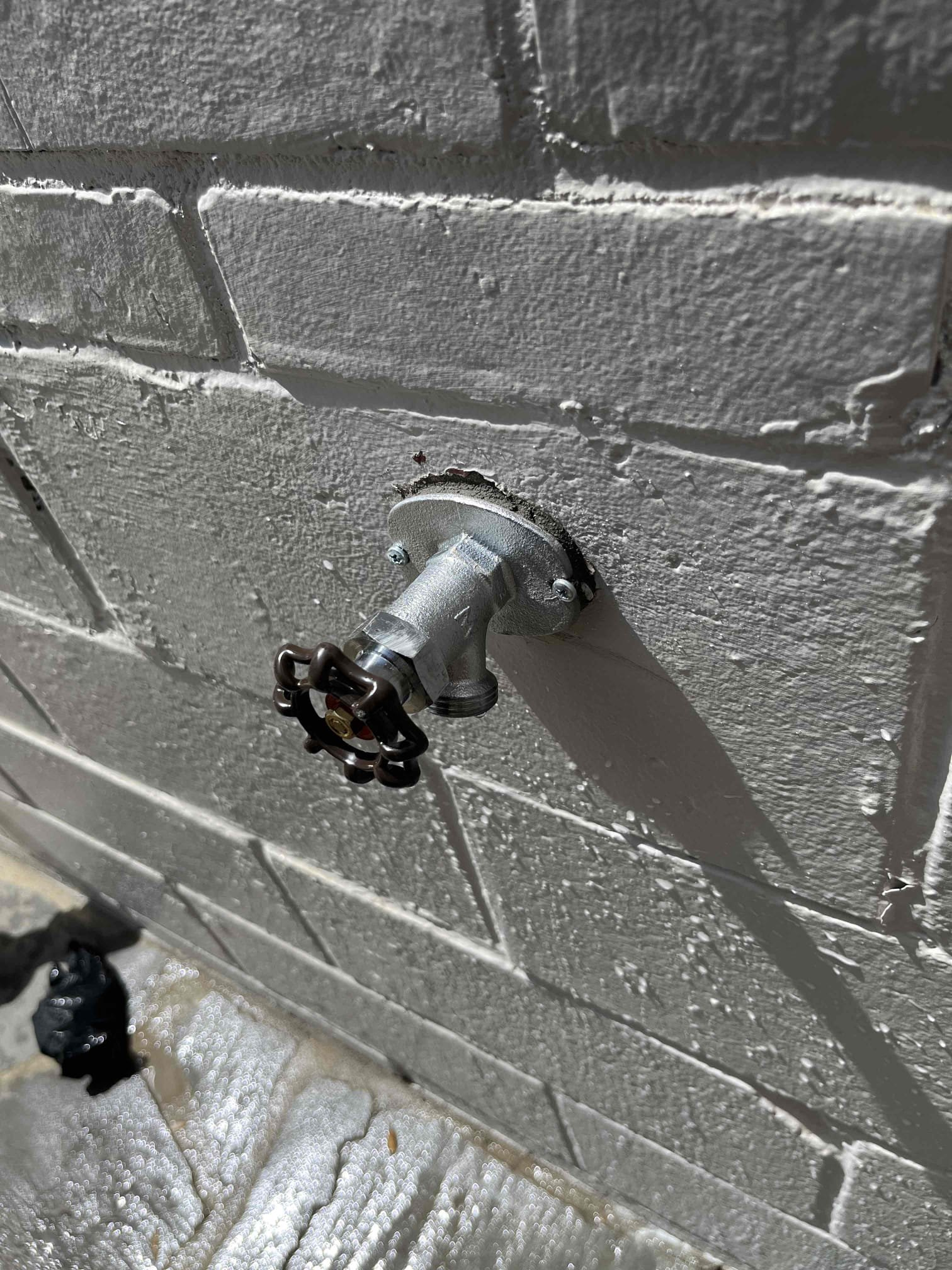 Replaced leaking frost proof hose bib by driveway. Resealed with hydraulic cement and secured with two points of contact. Tested work to ensure proper function and no leaks. Nine were found.