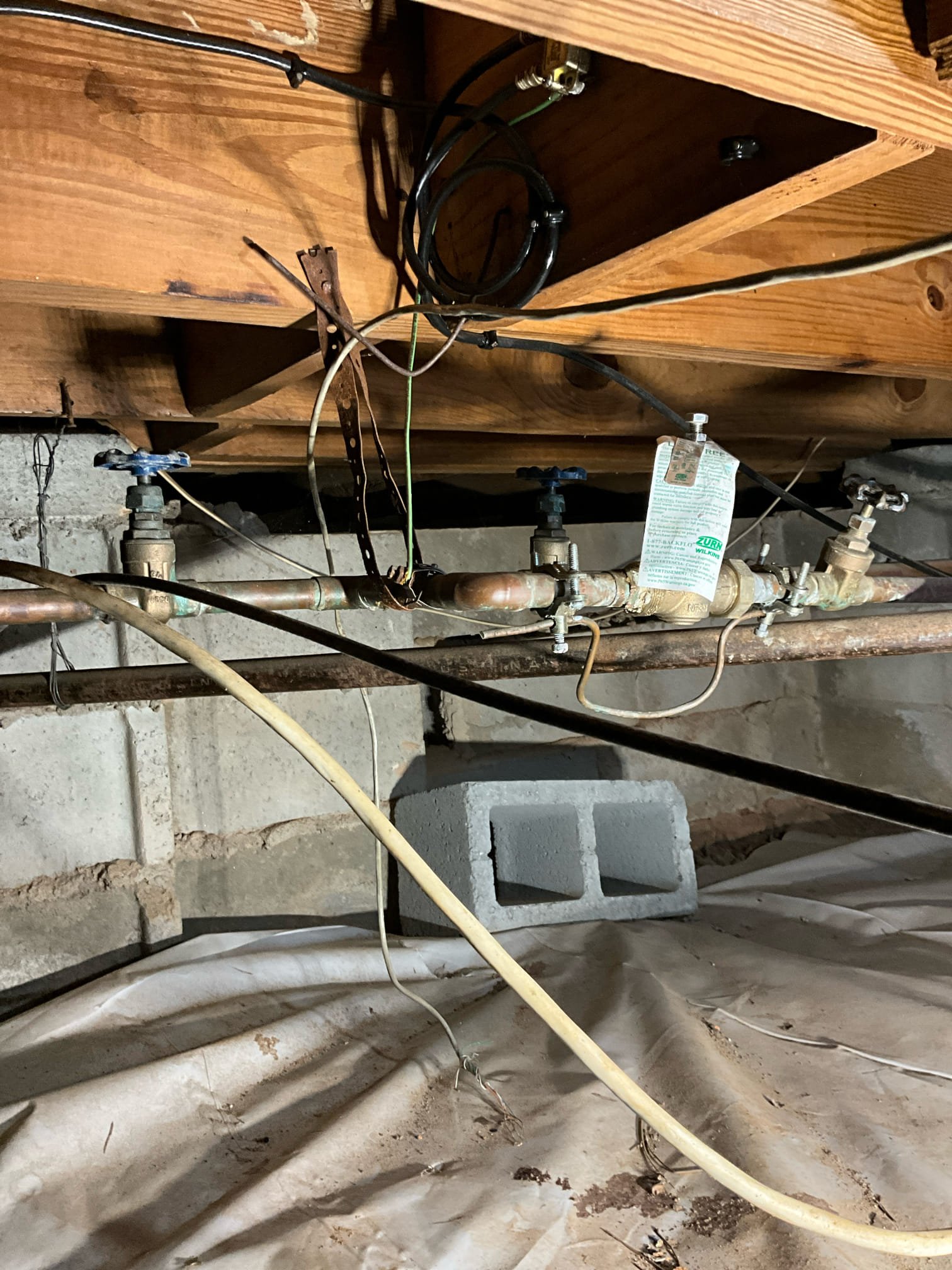 Call for water line repair from provision restoration. Invoice states waterline was nicked during restoration work.

Arrived and met with Miles. He showed me the work area.

I spoke with Daniel at provision restoration to verify how to safely and properly shut down and restart equipment in work space. 

Made repair to waterline on half inch copper right at floor level. I was able to access crawlspace via small panel in floor.

Slowly pressurized system and checked for other leaks. No other leaks t this time. Restarted equipment as directed and resealed containment space as it was when I arrived.