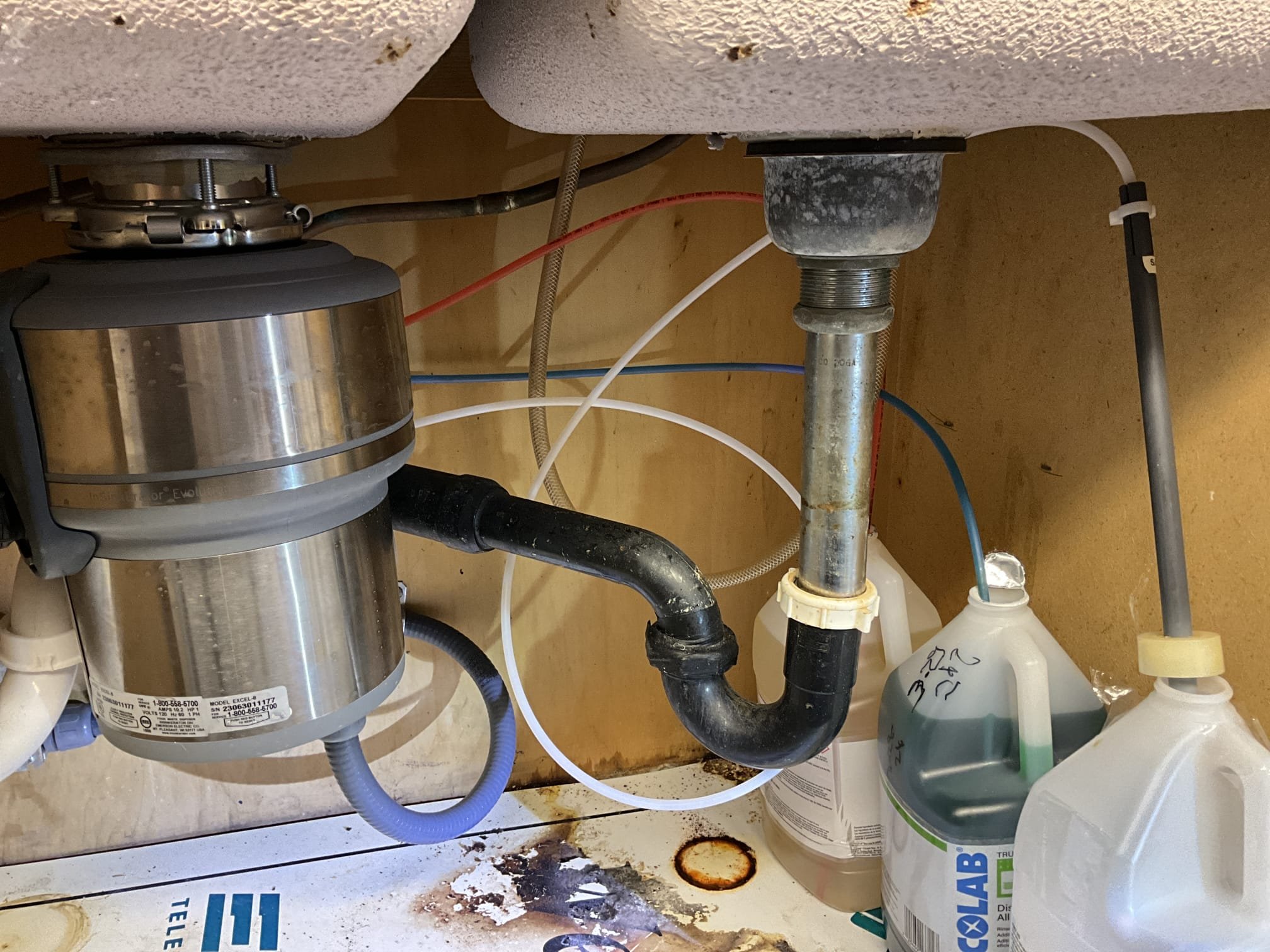 Customer had a back sloped drain for right compartment in kitchen sink. Cut the line back to the 45, re-sloped the pipe correctly, and replaced the ptrap. Applied customer’s coupon and tested work to ensure proper function and no leaks, none were found.