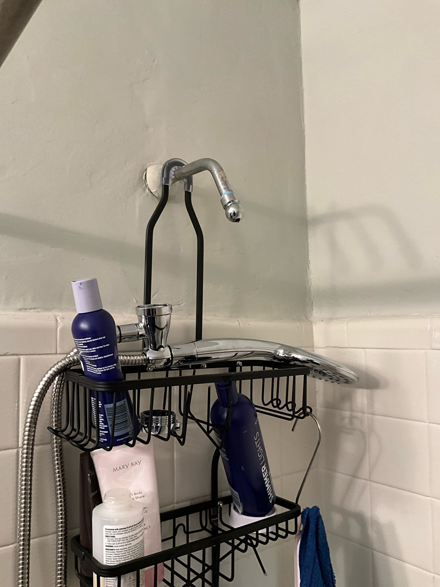 Tenant had removed the old shower head and had purchased a new one he needed installed. We installed the new shower head and tested to ensure proper function. No further issue at this time. 