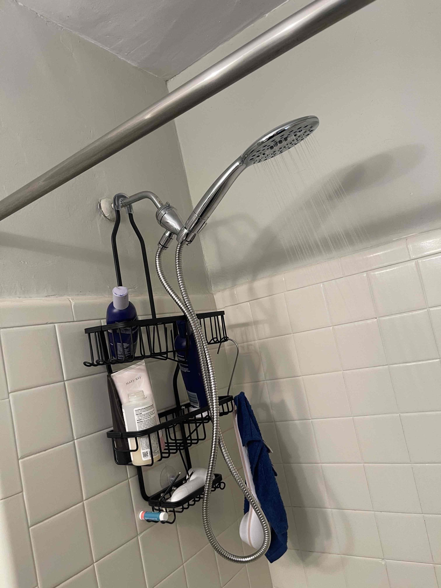 Tenant had removed the old shower head and had purchased a new one he needed installed. We installed the new shower head and tested to ensure proper function. No further issue at this time. 