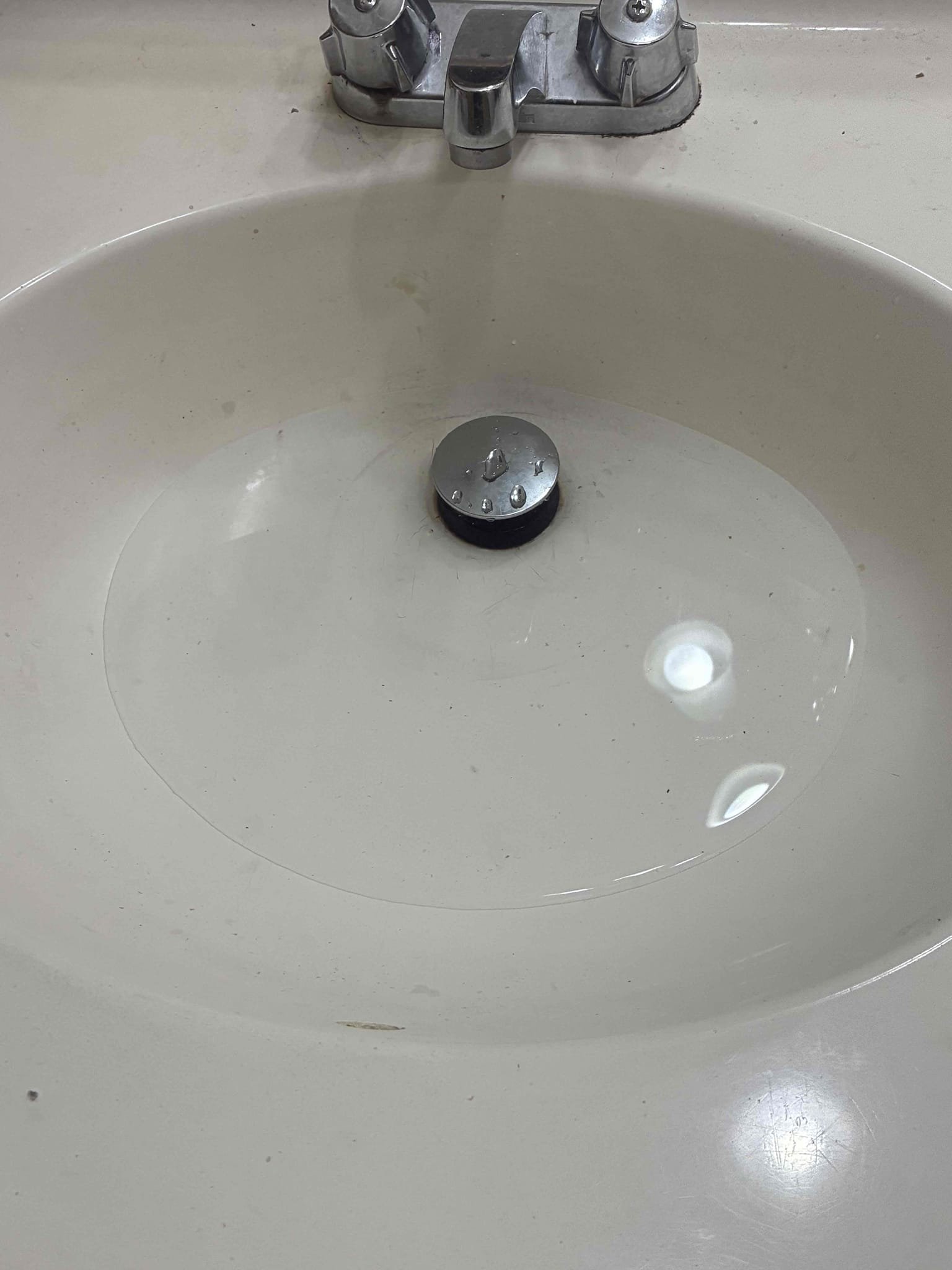 Customer had slow draining sink and loose toilet. Gave options for repair/replacements. Customer only wanted to address sink and did not want any additional items looked at in the home. Ran hand machine to clear drain filled drain to check for proper drainage function.