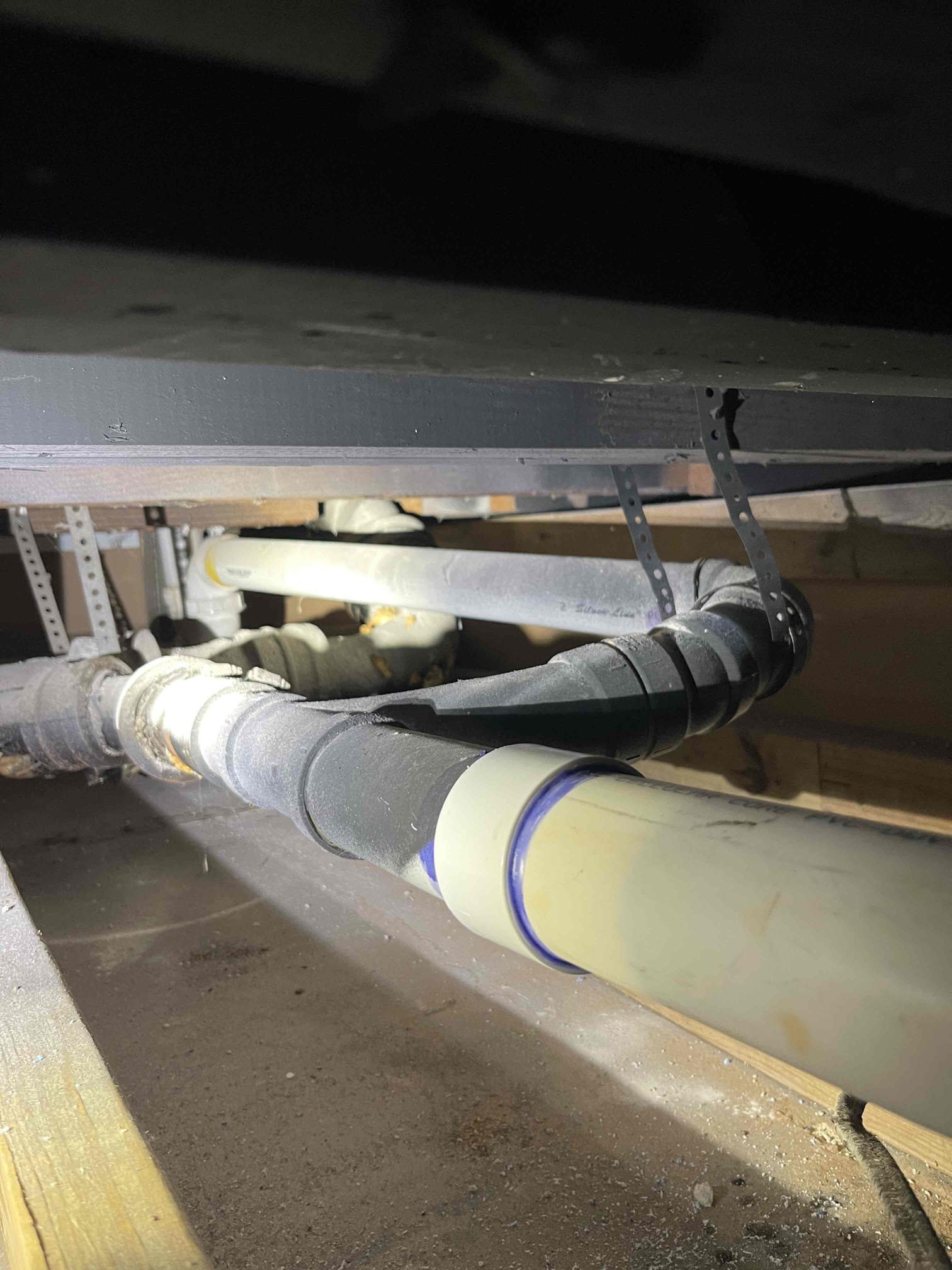 Came out to look at a bathroom that the homeowner had added on in the basement. Homeowner had some pictures from when the contractor did the work. There was nothing about the system that was installed correctly. No venting was done on any of the fixtures. There was a bathroom fan exhaust that was attached into the drainage system. System will require being completely ripped out and redone. We gave a quote to camera the system because the homeowner didn’t have enough pictures of the work done under the slab for me to be able to accurately assess what the total scope of the work will be. Water heater was also not to code. Needs an expansion tank and the t&p connected. Kitchen sink basket strainers are also leaking.