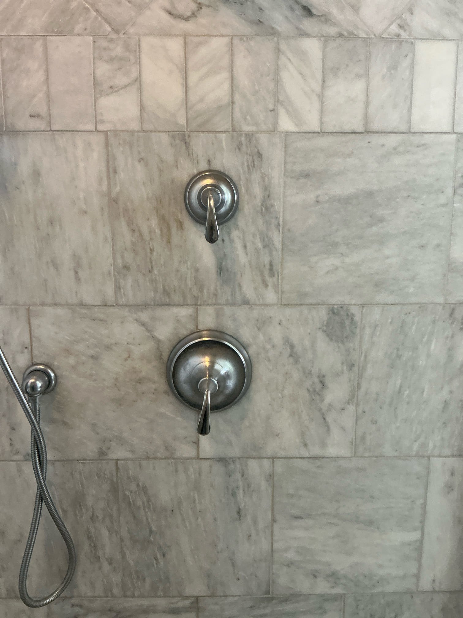 Upstairs master shower leak passed cartridge. Replaced Kohler cartridge in upstairs master shower. Tested and left in good working order.