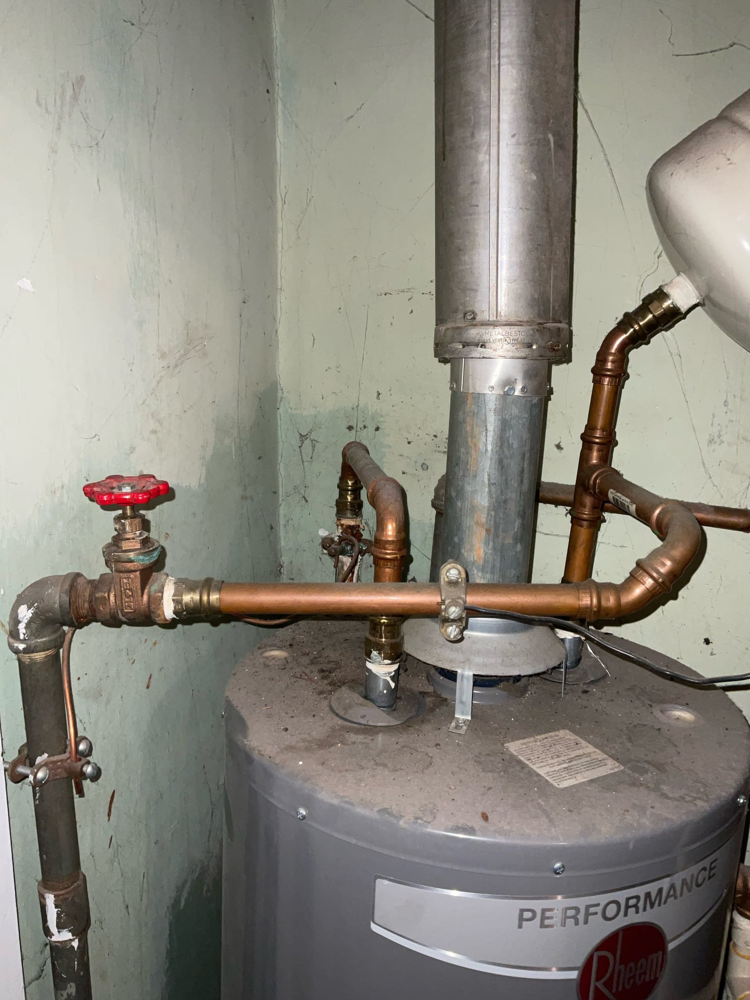 Customer stated that water heater was making a hissing noise. Went into crawlspace and found water coming down. Went back upstairs and shut off tank shut off and hissing noise stopped. Came to the conclusion that water heater was leaking given age of over 10 years old. Also found corroded galvanized piping. Will send customer estimates for repairs that are needed. Also recommended customer to provision for a free water damage inspection.

Currently, there is no active leaks unless galvanized piping brakes.