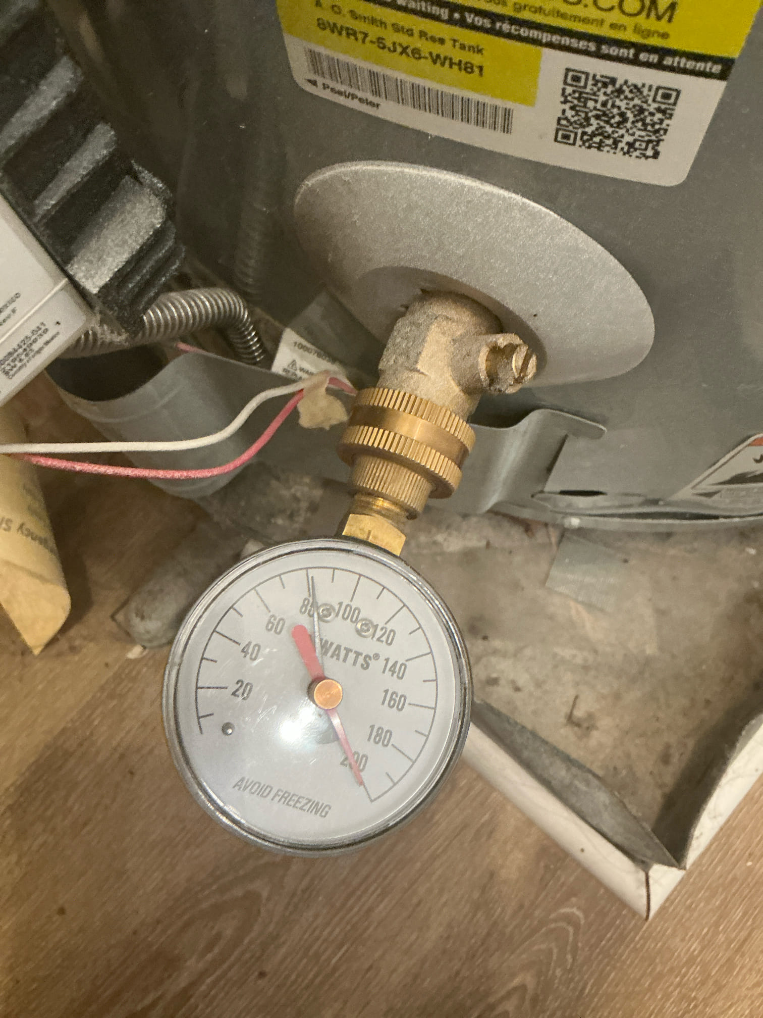 Found stop valve for dishwasher behind dishwasher. Moved stop valve under kitchen cabinet by customer request. Drilled additional hole in cabinet for supply line.