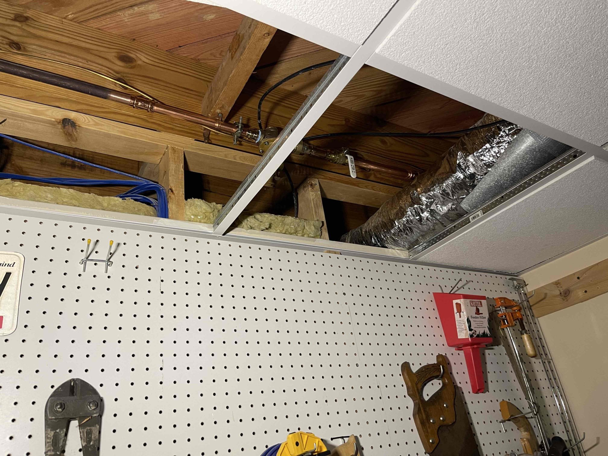 Replaced PRV. Set new pressure to 70 psi. Removed two tank water heaters and installed a Navien 240A2. Cut open the ceiling in the bedroom next to the utility room. Drilled two new holes through the foundation and ran my air intake and exhaust outside. Installed crossover valve under the kitchen sink. Tested to ensure proper function and a leak free installation. 