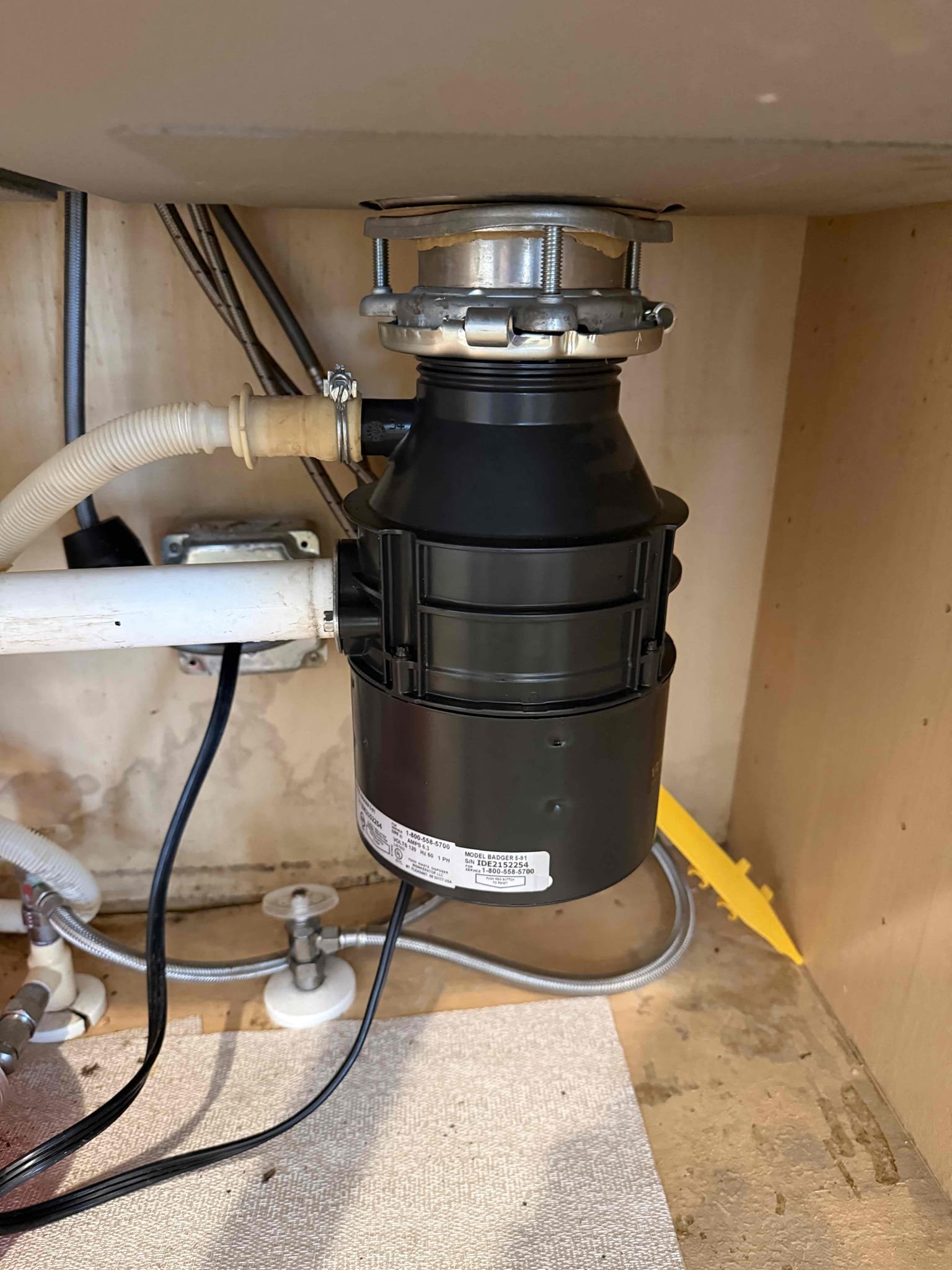 Garbage disposal not working upon arrival. Customer stated he dropped a spoon down the disposal and now it’s not working. Informed customer we could attempt to unjam the disposal first. After attempting to remove the spoon and it not coming loose informed customer we would need to replace the disposal. Gave customer estimate to replace with 1/2 hp disposal. Customer approved estimate. Installed new garbage disposal and re hooked up dishwasher line and tubular. Filled up sink and turned disposal on while the sink was draining. No leaks were found. Garbage disposal is working properly and no leaks upon departure. 