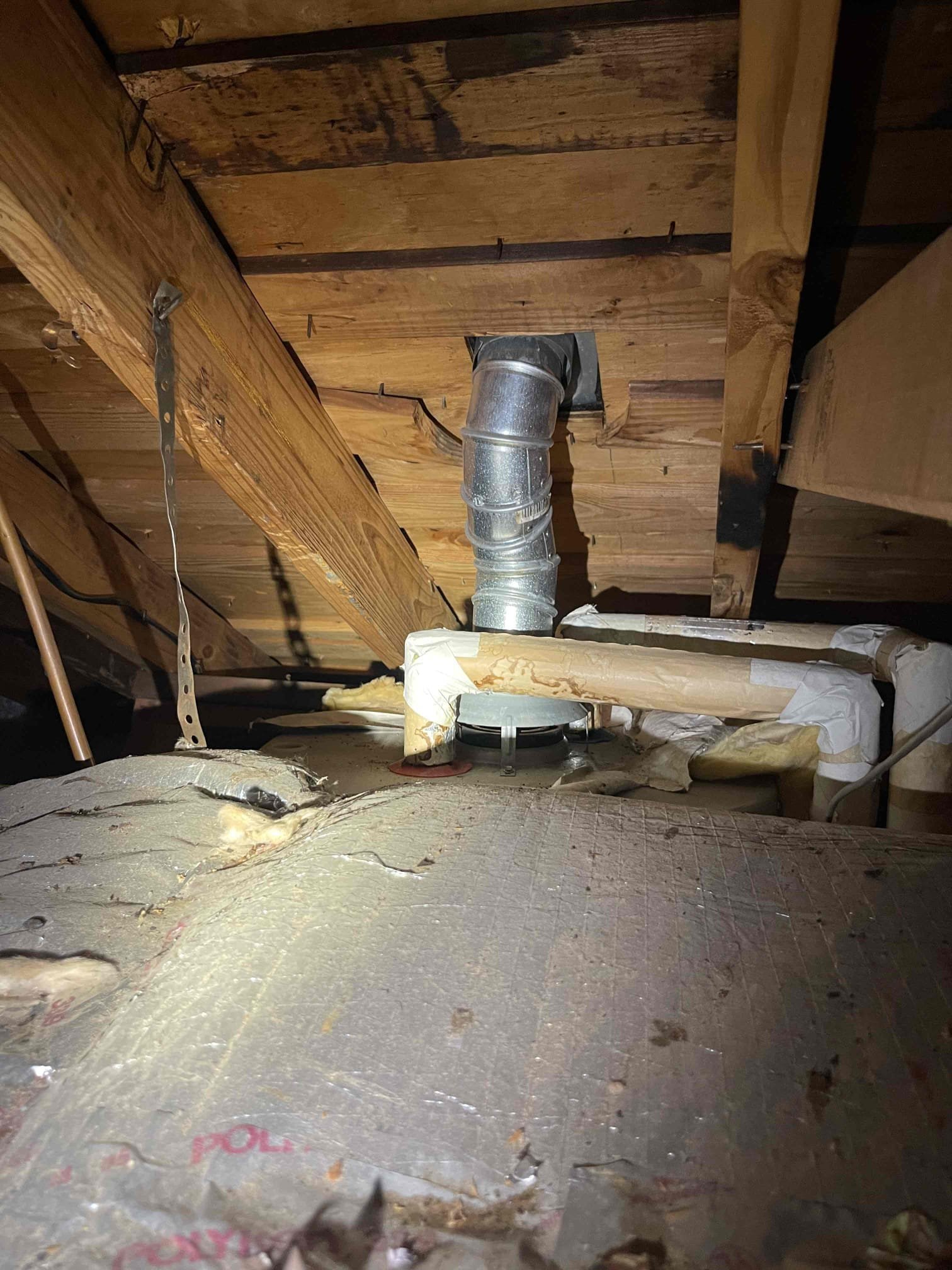 Water heater is from 2011. Left quote to replace tank. Replacement with same size heater using natural gas will require a hatch to be built into the attic, or for the stair framing to be removed. Water pressure was testing high, but I believe this was due to thermal expansion occurring after we lit the water heater. Unsure if the pilot light going out was due to a disruption in the gas service or due to the age of the unit, as we were able to get it to light first try and the burner assembly came on. Tank will have to be replaced at some point in the near future due to the age of the tank. 