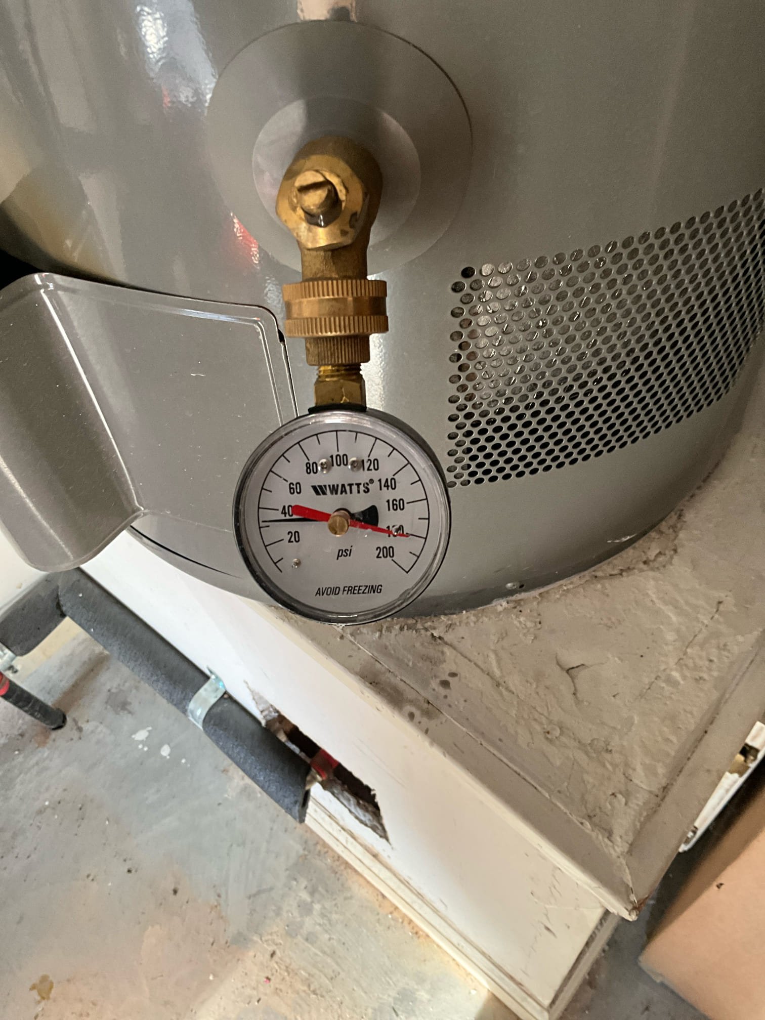 Call for water heater estimate.

Met with Ms. Marjorie. She had a waterline installed and has been concerned with the noise the water heater is making.

I inspected unit, and found it to be approximately 9-10 years old. The unit does not have a thermal expansion tank installed. The gas drip leg has a minor gas leak on the side branch of the tee. This leak was confirmed via gas leak detector and bubble solution, and video is attached. New waterline is 3/4 pex piping. The pipe is brought through the garage foundation without sleeping, using electrical tape asa sleeve. The grounding has been left disconnected under water heater. I was not able to determine if grounding was present elsewhere in the home. 

When checking the pressure, i found that there is a sure Wilkins double union PRV under the water heater. This has been replaced at some point in the past, but is not functioning. Pressure at front spigot read 100 psi, water heater and back spigot reads approximately 30 psi. Water heater