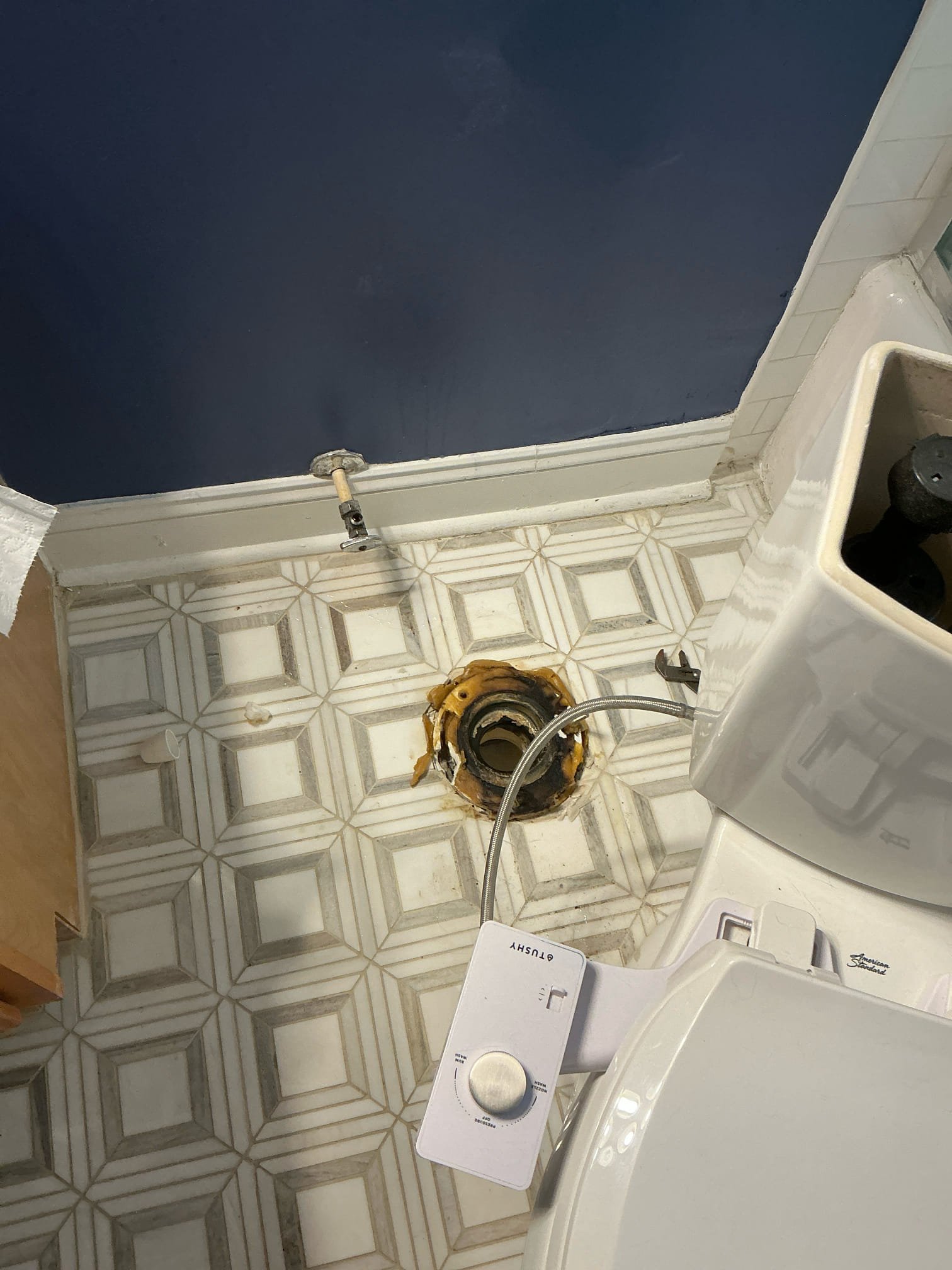 Found toilet loose at base. Pulled toilet and found flange broken. Replaced flange on 3” pipe. Reset toilet with new wax seal and supply line. Caulked toilet to floor.