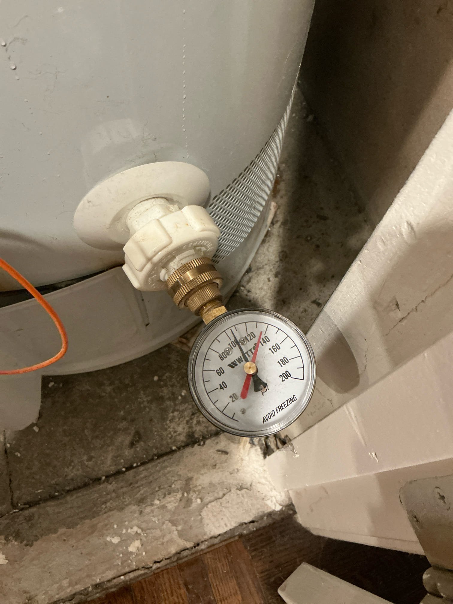 Found thermal expansion tank leaking from pin hole at top. Replaced thermal expansion tank. Pressurized to 80 psi.