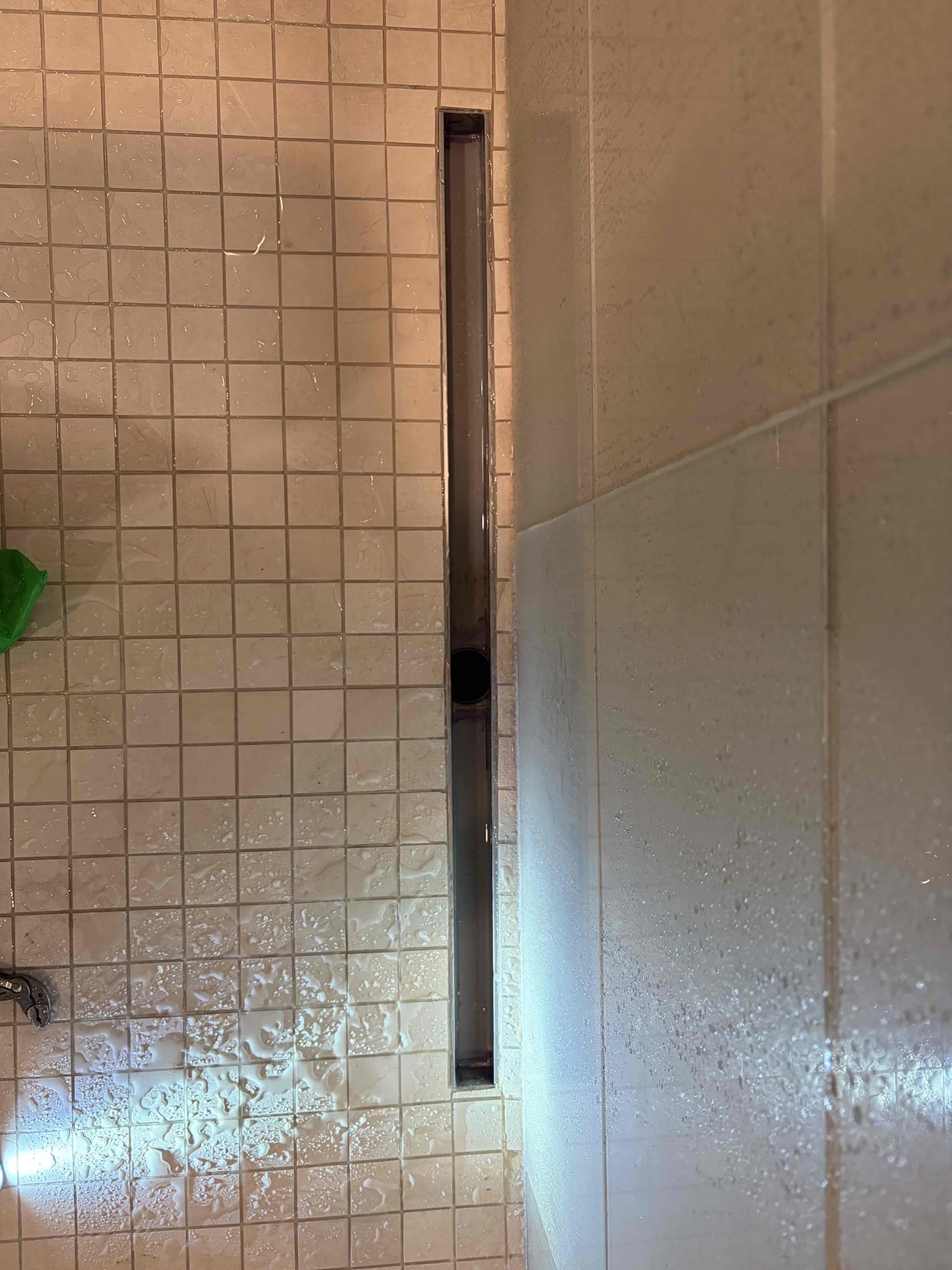 Came out to this home for a stopped up drain in the shower upstairs hanging over the garage. There was a lot of organic matter in the floor drain of the shower. The drain had the grate cover for the shower drain, I had to pry it up followed by lifting it with channel locks. I cleaned all the organic matter from the drain out followed by using my flex shaft to properly clean the walls of the pipe. Once completed the shower drains perfect now. Did not look at the whs, however the water pressure is at 50psi, (normal). 