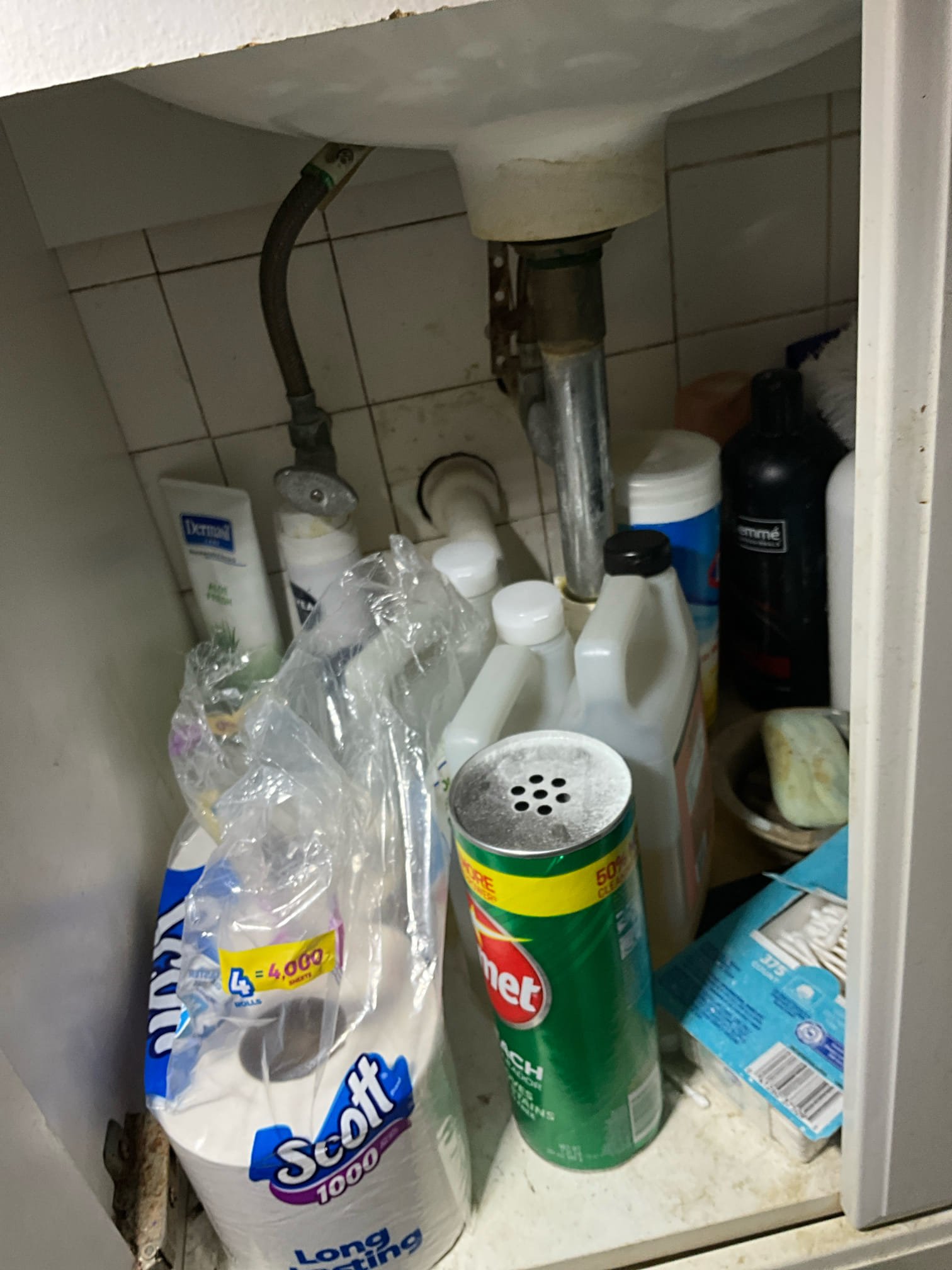 Call for sewer back up.

Arrived and met one tenant (Alex) Alex states that the sewer has backed up and the adjacent unit has the same problem. He showed me a video of sewage entering the crawlspace under the home.

I inspected both units and found symptoms consistent with main line backup.

Crawlspace inspection revealed sewage all over the floor in several spots from seepage and old sewer lines. The right side unit (As seen facing the house from the street) has had a wax ring failure and the subfloor is very damaged. Sewage has also spilled from here. 

Cast iron line exits the house, and it appears to be cast iron in the yard as well. I dug up a section in front yard to show me that at least a couple feet are cast iron here.

Due to the severely deteriorated state of the cast iron my recommendations were as follows: 

Absolute resolution: Replace cast iron sewer lines inside crawlspace, and in front yard

High priority task: Install cleanout to allow hydrojetting, jet line and camer