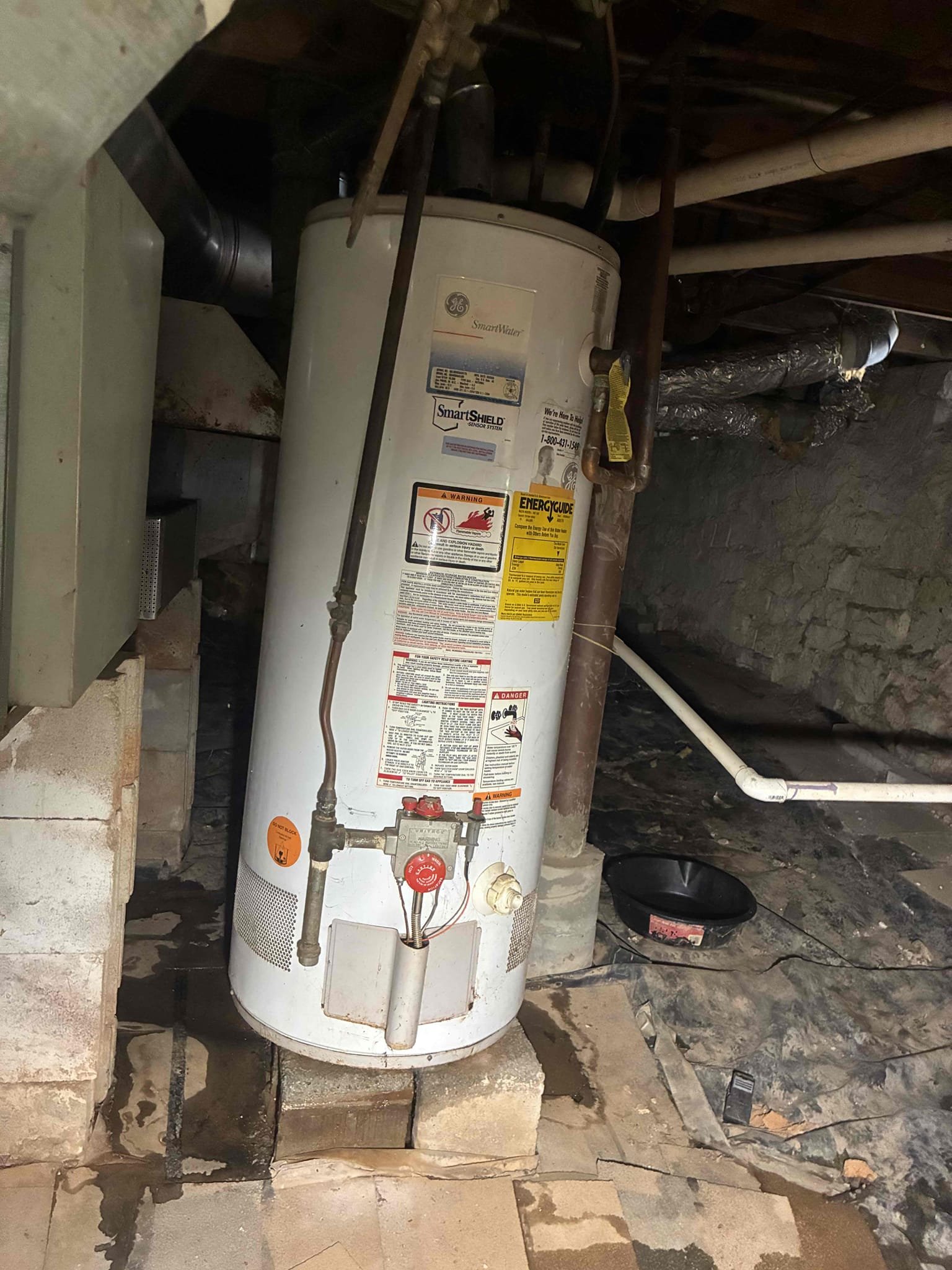 Customer called with complaints of no hot water. went down into crawlspace where heater was located and found heater to be busted and leaking into crawl. Explain to customer only way to fix is to replace tank gave options/repairs in order to address issues also found no PRV on home pressure to be at 120 psi. Replaced water heater with new rheem 40 gallon water heater and installed new PRV. After work was complete checked area for leaks and proper function. Pressure is now set at 60 psi.