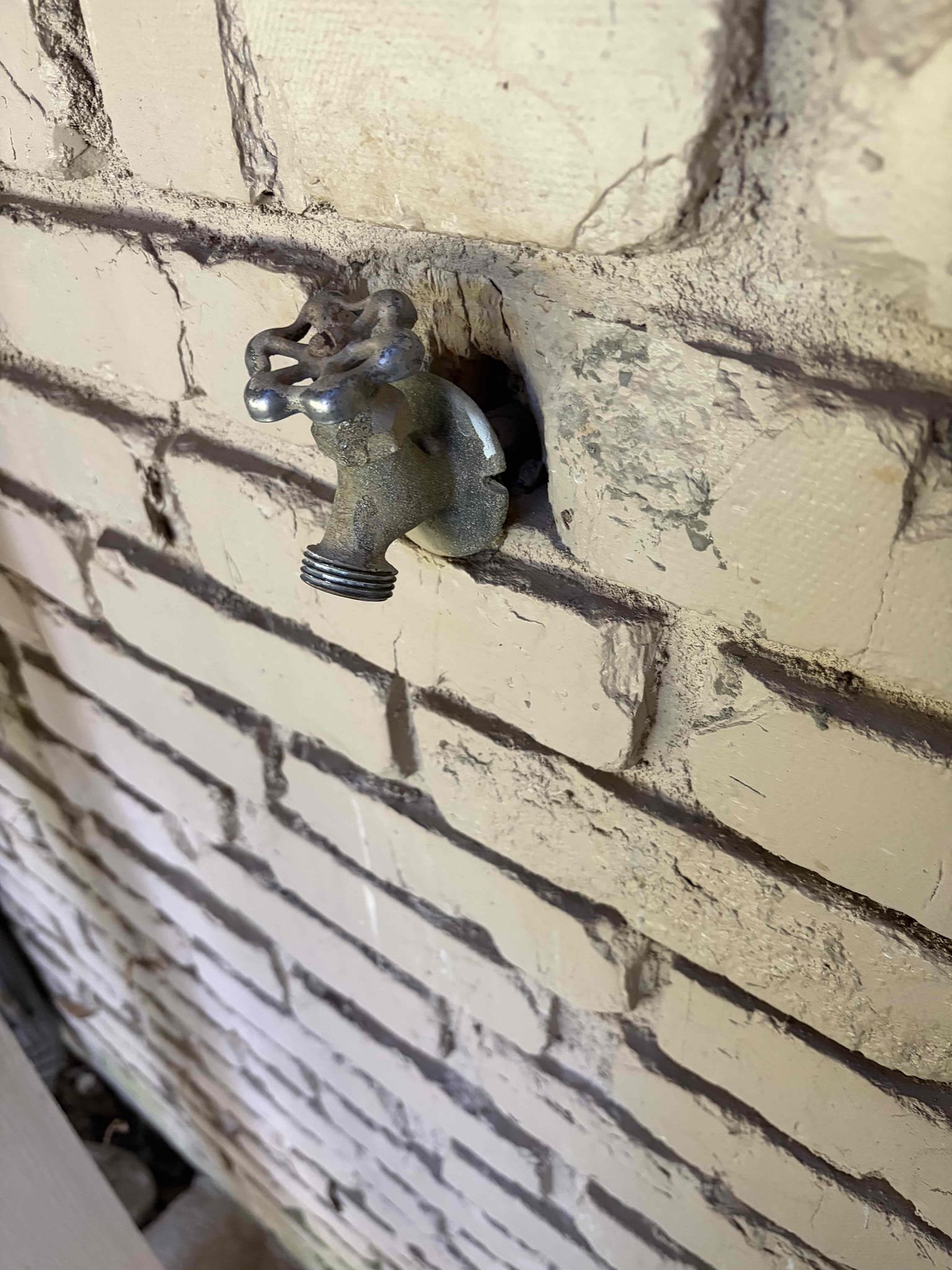 This job the customer had a bib that went turned on it would leak rather go in the repair route of trying to fix the old hose bib. I recommended just go ahead and replace it with a brand new one so that is exactly what we did we replaced the hose bib with a brand new one the shut off valve behind. It also needed to be replaced so we cut all all that out. They had the pipe coming in from three-quarter down to half inch so I reduced it up a little bit higher installed a new ball valve so you can turn it off in the winter time. For that I installed the new three-quarter hose bib. There’s no leak after installation. There was a really big hole in the cement from the prior hose bib so I use this much cock as I could to clear that hole so no bugs and critters get inside. I used clear caulking for the installation comes on as WHITE goes clear after a couple hours Was no way to secure the hose bib to the wall based off of how the brick is would have to chip the brick out in order to properly s