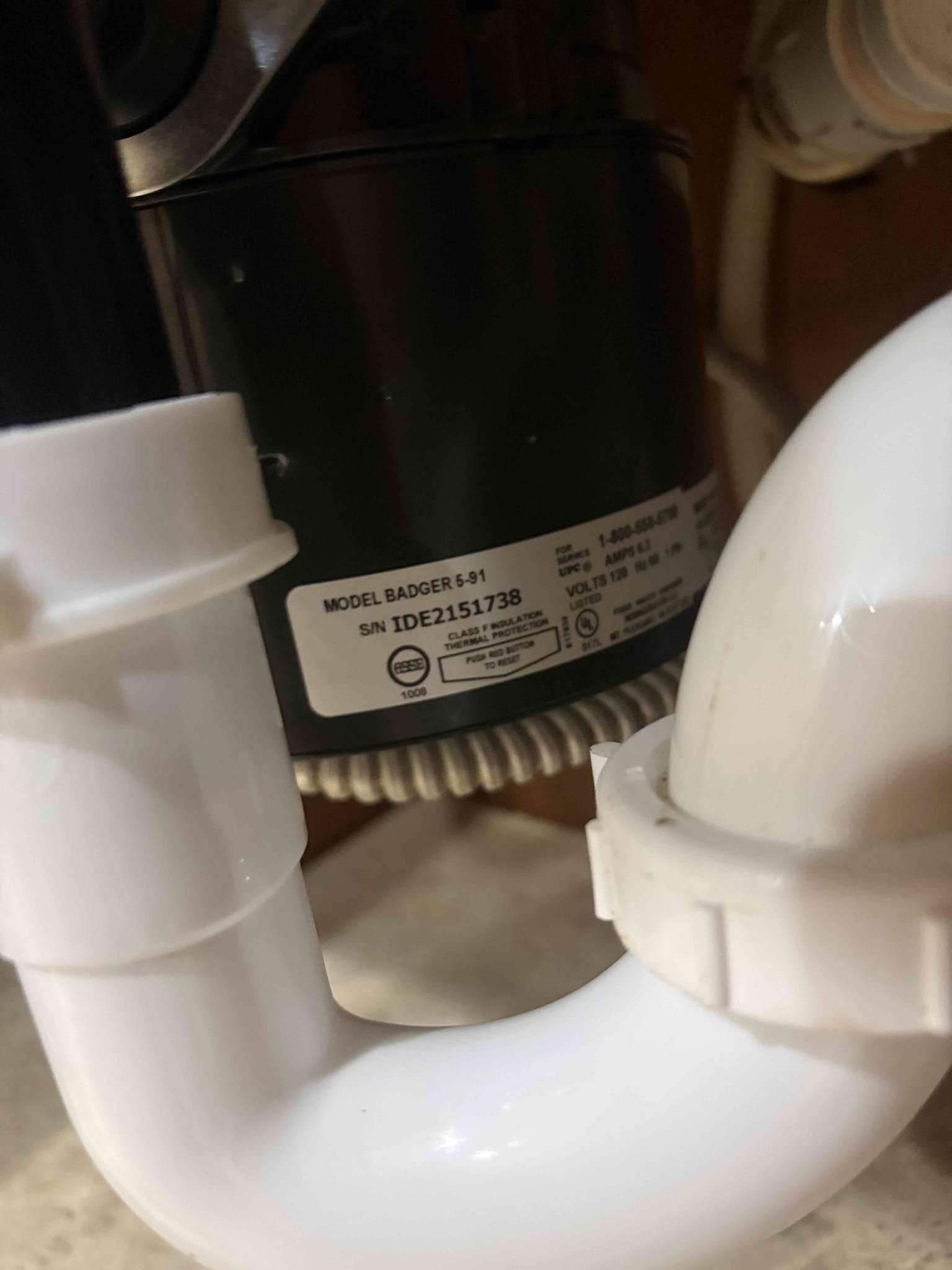 For this customer came out to their home for mysterious leak underneath their sink. It would only happen every once in a while and when I got there, it took a look underneath the sink to figure out where that leak is coming from narrowed down to the garbage disposal because there is a small drip coming from the disposal itself so therefore that is exactly what we ended up replacing today. Start a new half horsepower garbage disposal along with a New P-trap to finish the project installed two new wire notes for the positive in the negative attach the ground wire to the green screw follow that knocked out the plug for the dishwasher hose loop and install the new bracket with brand new putty once installed. There are no leaks in the customer is all set to use a brand new garbage disposal with no leaks. I did not look at the water heater because of their tenant in the basement along with the water pressure was not able to get a pressure reading today. 