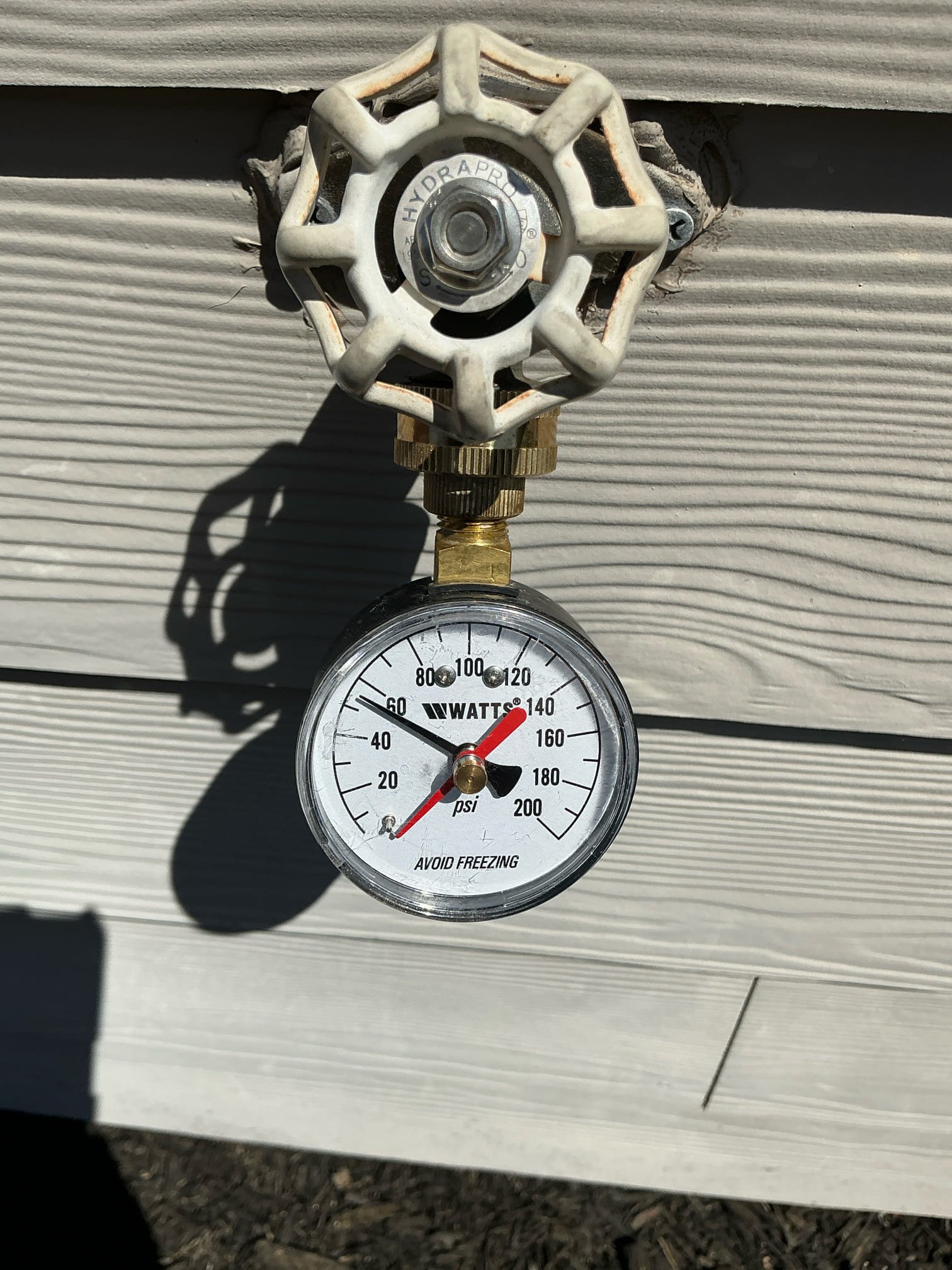 Replaced stem and handle of broken hose spicket. Most likely cracked due to cold temperatures. Also removed both anti siphon devices that were failed off of both hose spickets, tested for proper operation and no leaks or additional issues found after job completed 