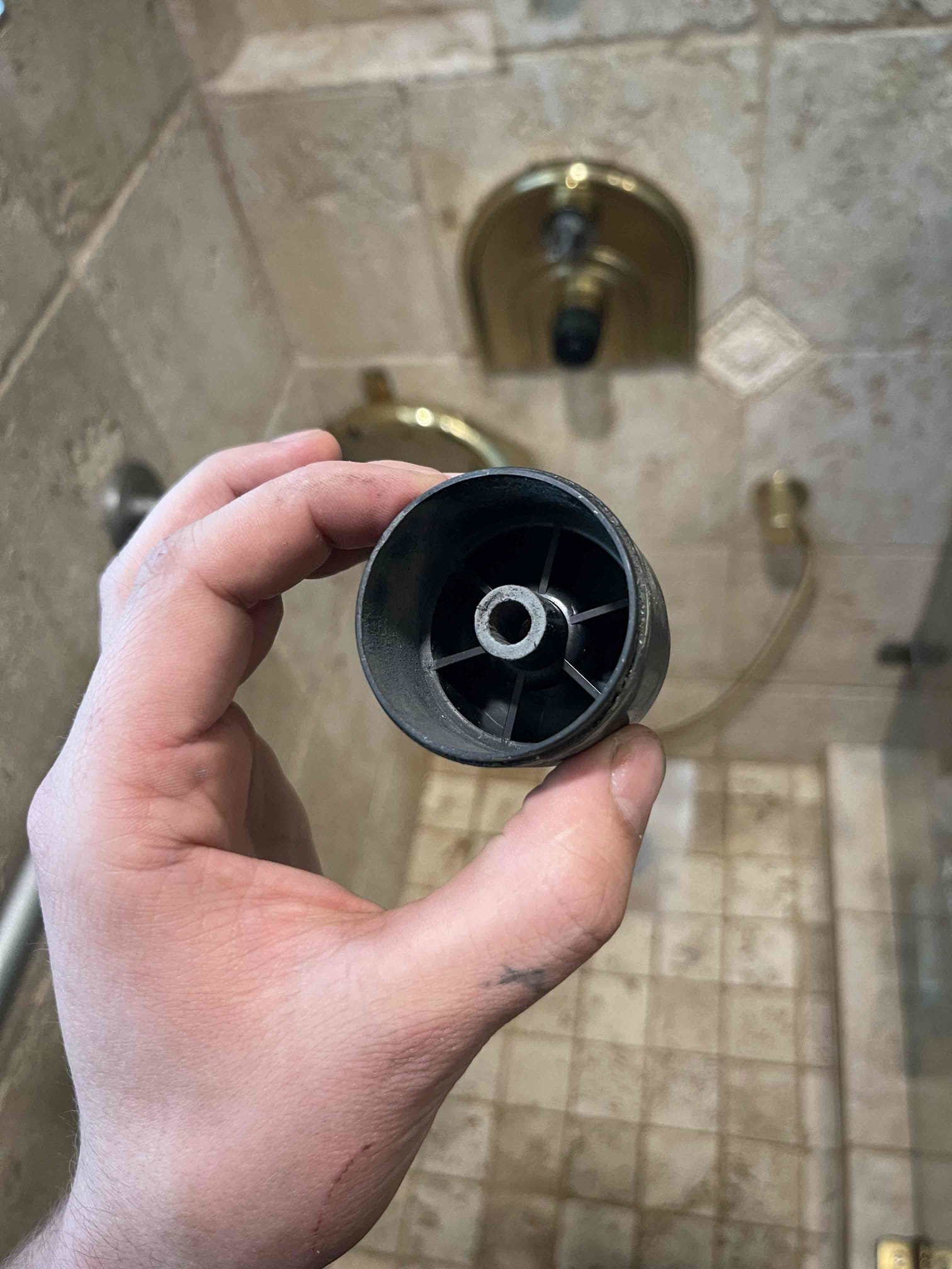 Customer had the trim removed to the shower upon arrival. We inspected the parts and found the plastic grooves inside the handle were sheered. This is an old grohe shower valve that has been discontinued. Shower itself is still functioning if you turn the stem of the cartridge. Customer elected to just turn the stem with a wrench until he can contact grohe and see if they still make that plastic part. He also inquired about a very slow drip on the kitchen faucet. Gave him a quote to rebuild the faucet. He elected to go get the parts and repair it himself. 