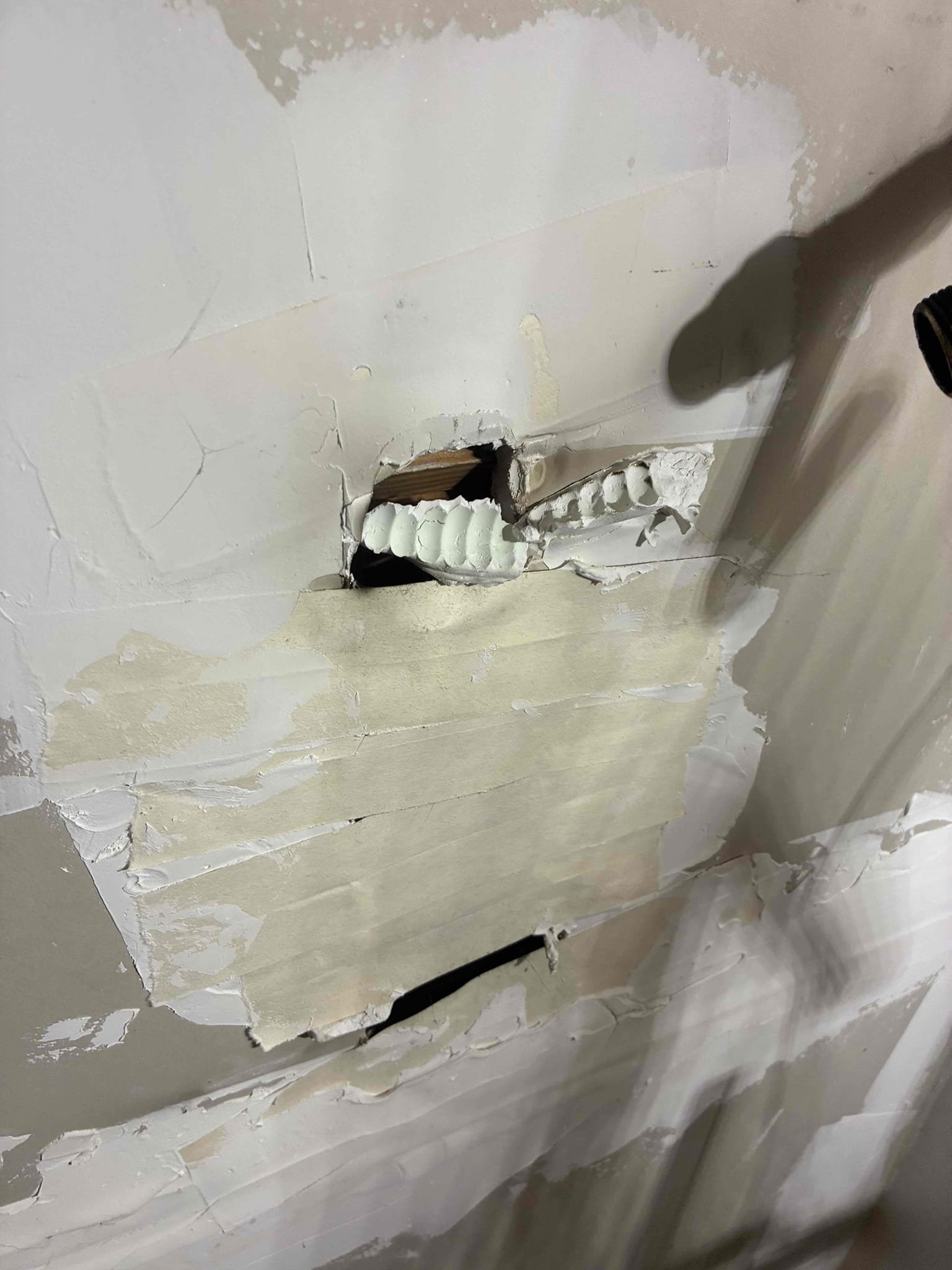 Customer had old water heater needing replacement due to not heating properly. Gave Customer options for repair and scheduled to do the work the following day. Return the following day to remove old heater and install new Rheem 50 gallon electric heater. After installation checked for leaks and proper function of heater showed Customer small hole in ceiling above heater from old heater install. 