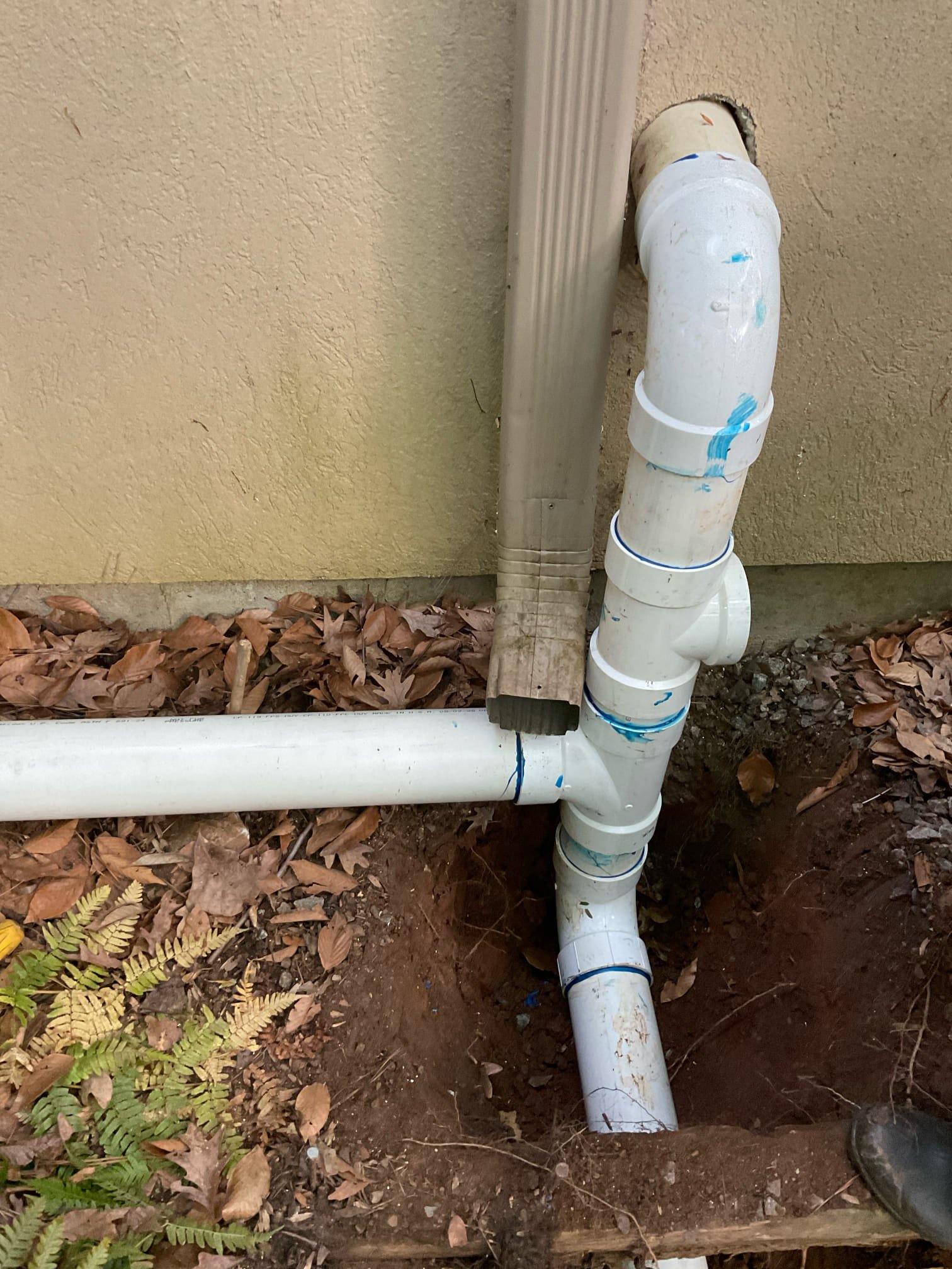 Sewer main line snake , camera , locate and fixed problem , approximately 40 feet new sewer line reroute and installed with new clean out , hand digging and back fill the area in the back of the home 