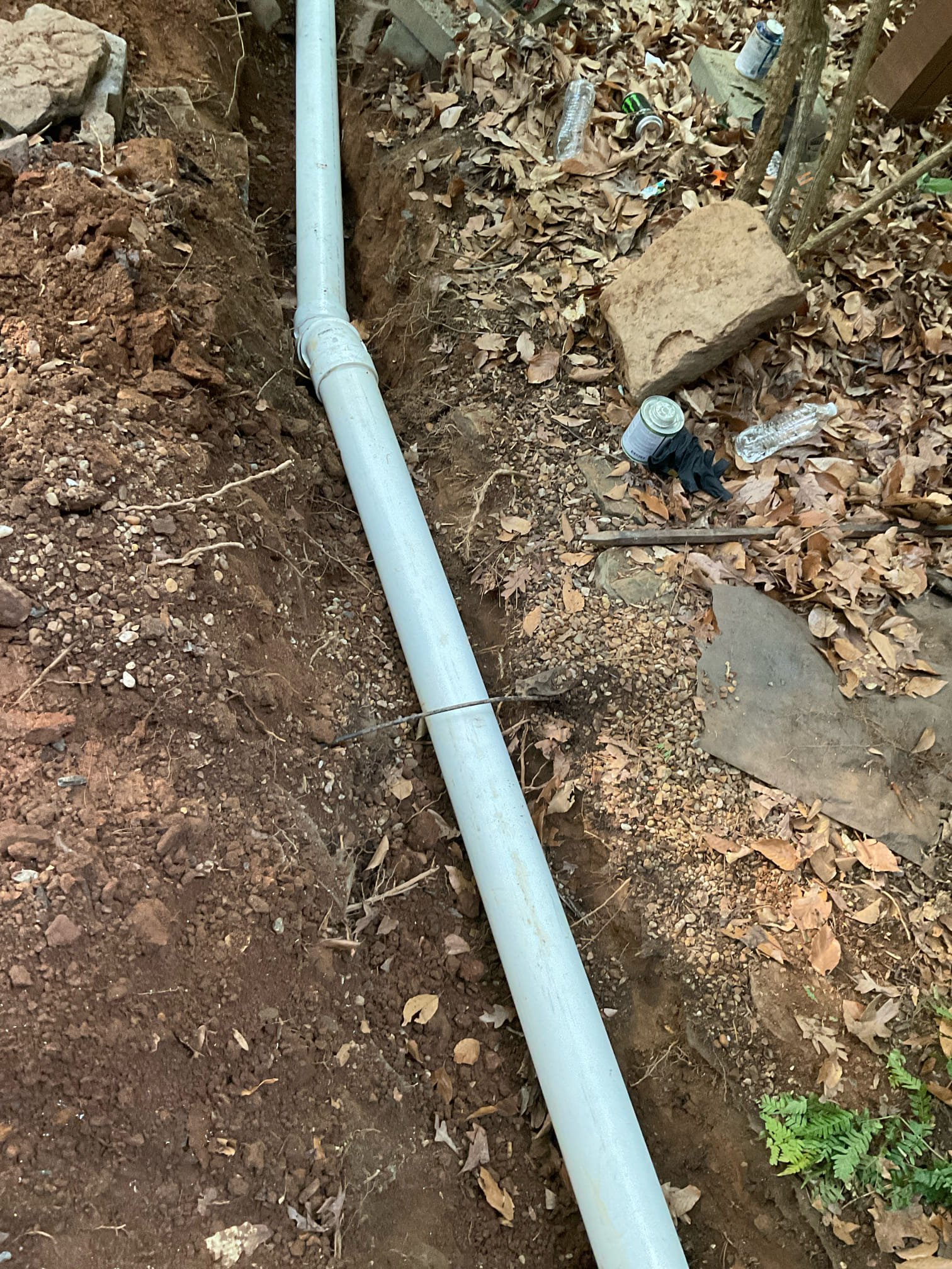 Sewer main line snake , camera , locate and fixed problem , approximately 40 feet new sewer line reroute and installed with new clean out , hand digging and back fill the area in the back of the home 
