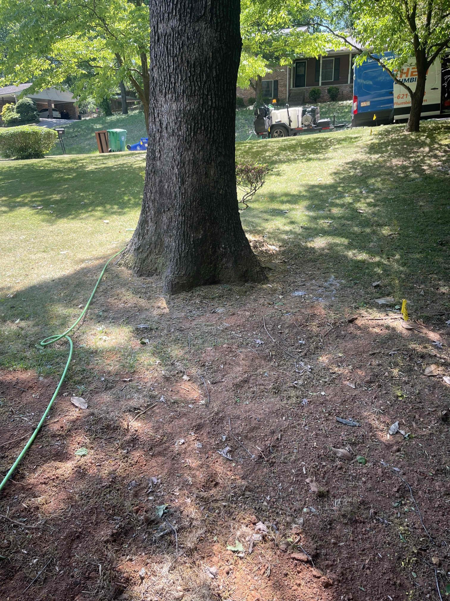 Came out for a back up. We have done multiple repairs to this sewer line in the past. Opened the cleanout and found it was holding water. Ran snake and cleared blockage. Camera’d the line and found a root intrusion next to the massive tree in the front yard. Customer elected to jet the line and trim the roots back for the time being. Was able to reduce the root intrusion down to a 30% reduction in pipe size and cut all of the roots out that were covering the bottom of the pipe. Roots were too thick to trim back any further after over 10 attempts to do so at 4000 psi. Left quote to replace the remaining cast iron inside the home and redo the main sewer line down to the city main. Recommended the customer have that large tree removed and then we can come back and reassess the sewer line to quote possible replace around 20’ outside the home to remove the break in the cast iron. Will be difficult to do currently due to proximity of the large tree and the gas service line. Sewer line drops 
