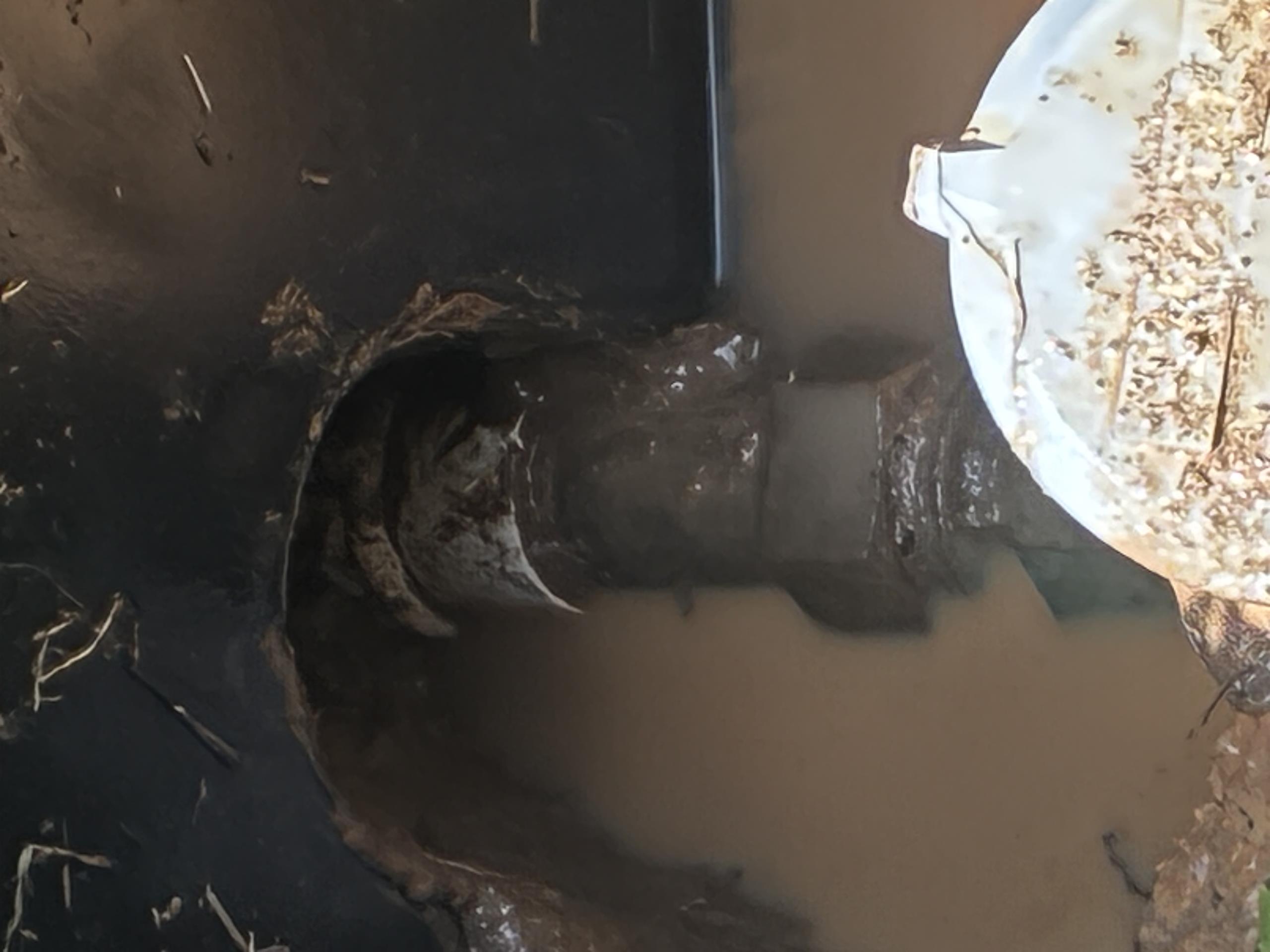 Call for leak near water meter.

Arrived and met with Jim on site. He states that the water utility service left a notice that he had a leak on his side of the meter yesterday.

I inspected meter box after draining water. Meter nipple is brass, and appears to transition to a pvc plastic female. Home is ~50-60 years old. I could hear and see spray from the mainline side shooting towards meter box (video attached).

Jim mentioned that he has performed a mainline repair on the pvc near the house foundation many years ago.

I discussed findings with Jim and advised that there are two options to address the issue. The simple option is to perform a spot repair. This leak may be a result of tension and a plastic female adapter. A spot repair can be performed, and fittings placed to remove tension off of the line if found.

Second is a waterline replacement. Jim mentioned no other issues, with the exception of the main repair before, and would not like to pursue this route.

Today, Jim mention