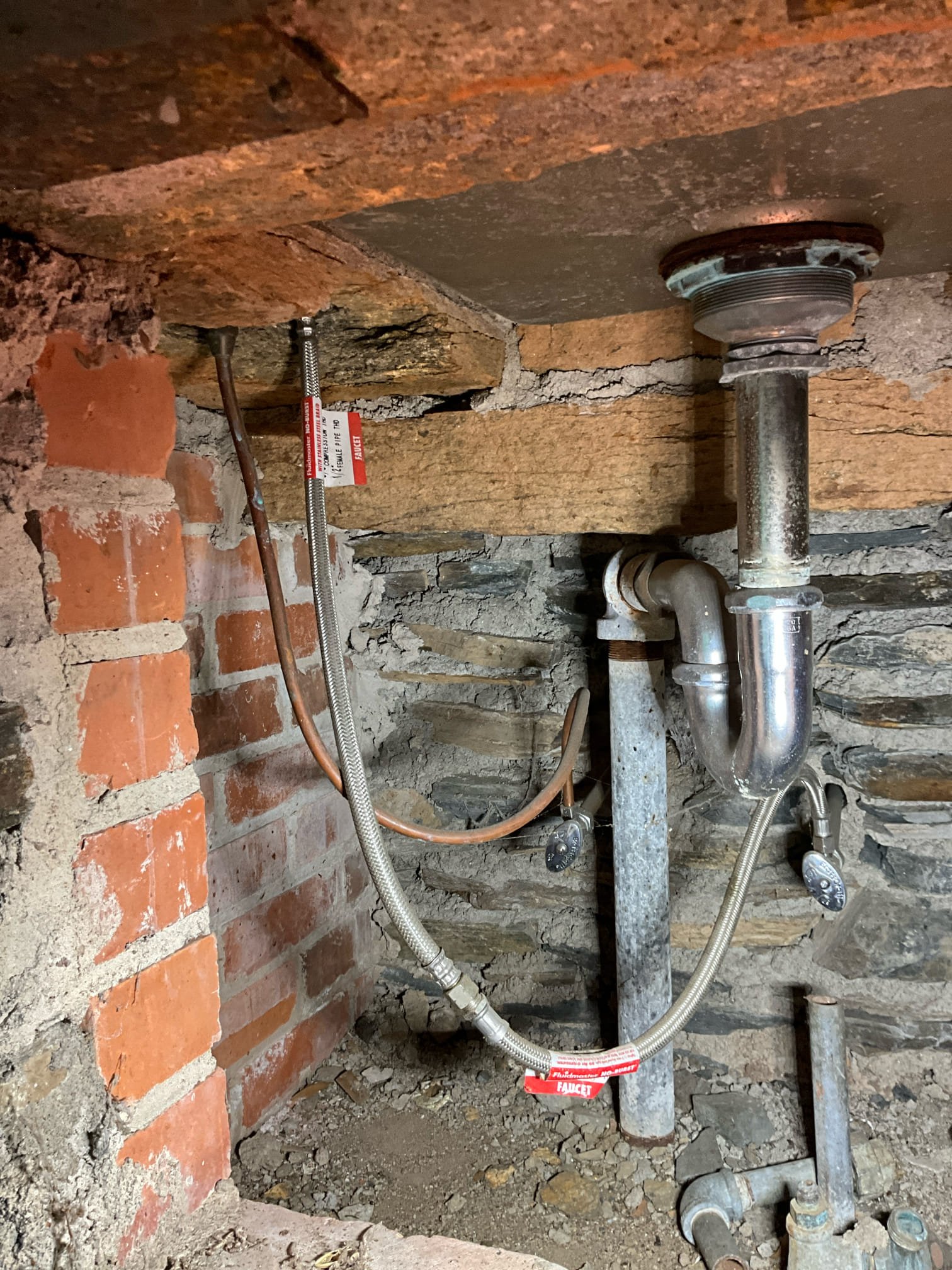 Call for several issues and a customer service concern.\Arrived and met with Anna on site. She stated the following concerns:

Previous visit with Eric Valdezwas handled poorly. Eric mistakenly repaired the incorrect p trap for a shower drain problem. HE then promised to refund or credit that fee on a return trip that was not scheduled or completed.

The garage/apartment behind the home has several concerns. Leaks and burst pipes in two locations), and a sewer escape in the ceiling.

Ms. Anna walked me through the home, basement, apartment and garage, and back entertainment area.

Inspection revealed the following:
At least three large holes burst from frozen weather. Two near the shut off, one near the hose.
-Sewer escape under tub, likely secondary symptom of backup on sewer line. Break by p trap, and crumbling pipe between final fitting and main termination.
-Water heater has three possible leak locations, an inoperable gas control valve, and no thermal expansion tank. T&P valve con