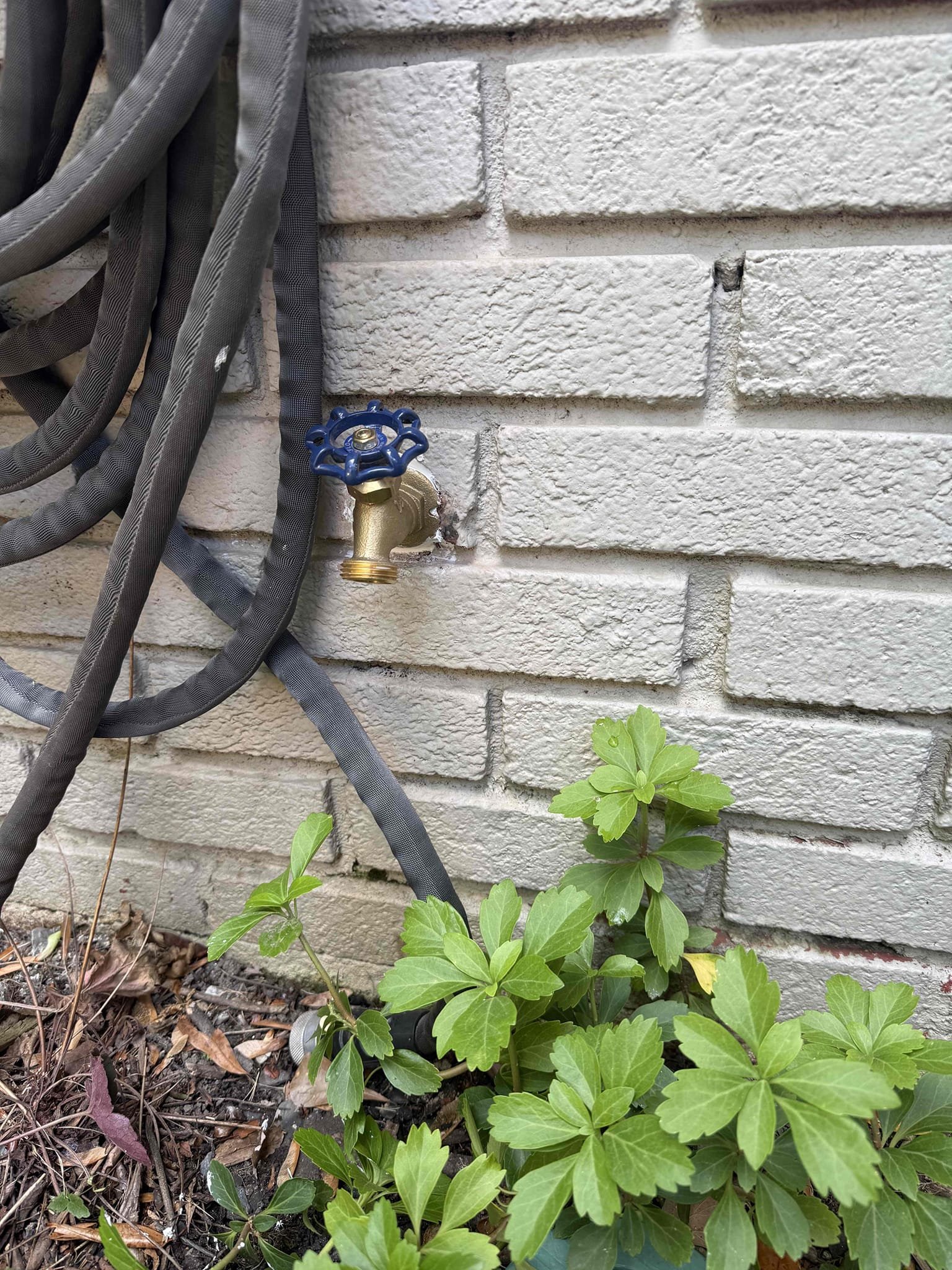 Hose Bibb leaking upon arrival. Customer stated she is just now using her hose Bibb since the winter and she noticed water coming from behind it. After looking informed customer her hose Bibb cracked on the backside and is spraying out water when it’s turned on. Informed customer she had a freeze proof hose Bibb and we could go back with that style or replace it with a traditional style while adding a shutoff. Customer stated she wanted to go with the regular one due to the price being cheaper. Gave customer estimate, customer approved estimate. Installed new hose Bibb with a new quarter turn ball valve and labeled ball valve in crawlspace. Due to the size hole that they drilled when the house was built I had to caulk the inside of the brick to fill in the gap. Informed customer not to use hose Bibb for a minimum of 24 hours to allow caulk to sit up and dry. Turned water back on to check for leaks and found no leaks. Hose Bibb is working properly and no longer leaking. No leaks upon de