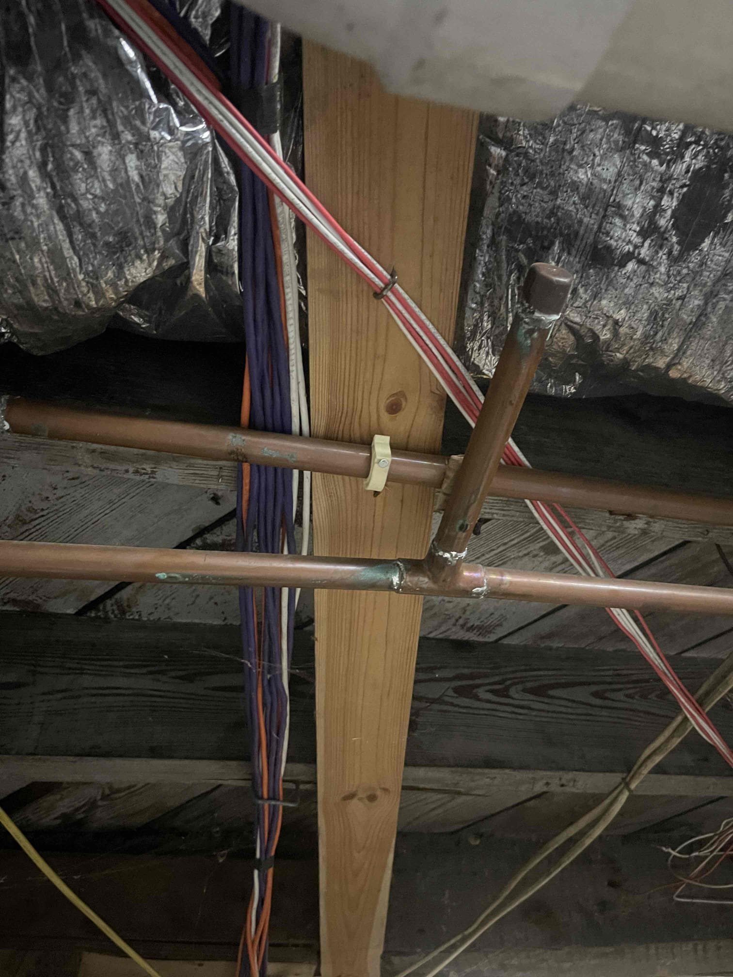 Did not get any air coming out of the fixtures. Water pressure tested in the normal range again. There was a noise with the pipes rattling despite the washing machine having hammer arrestors. Found a stretch of piping that was loosely supported. Added a few clamps onto the piping and 5e rattling issue was fixed. They said the air would happen randomly so I’m unsure what exactly caused it, but may be related to the frequent water main repairs the city has to do in this area. We followed all of the piping from the water heater back and verified we didn’t have any cross connections anywhere. Ran water at the kitchen sink and laundry sink and never had any air come out of either. No further issue at this time.