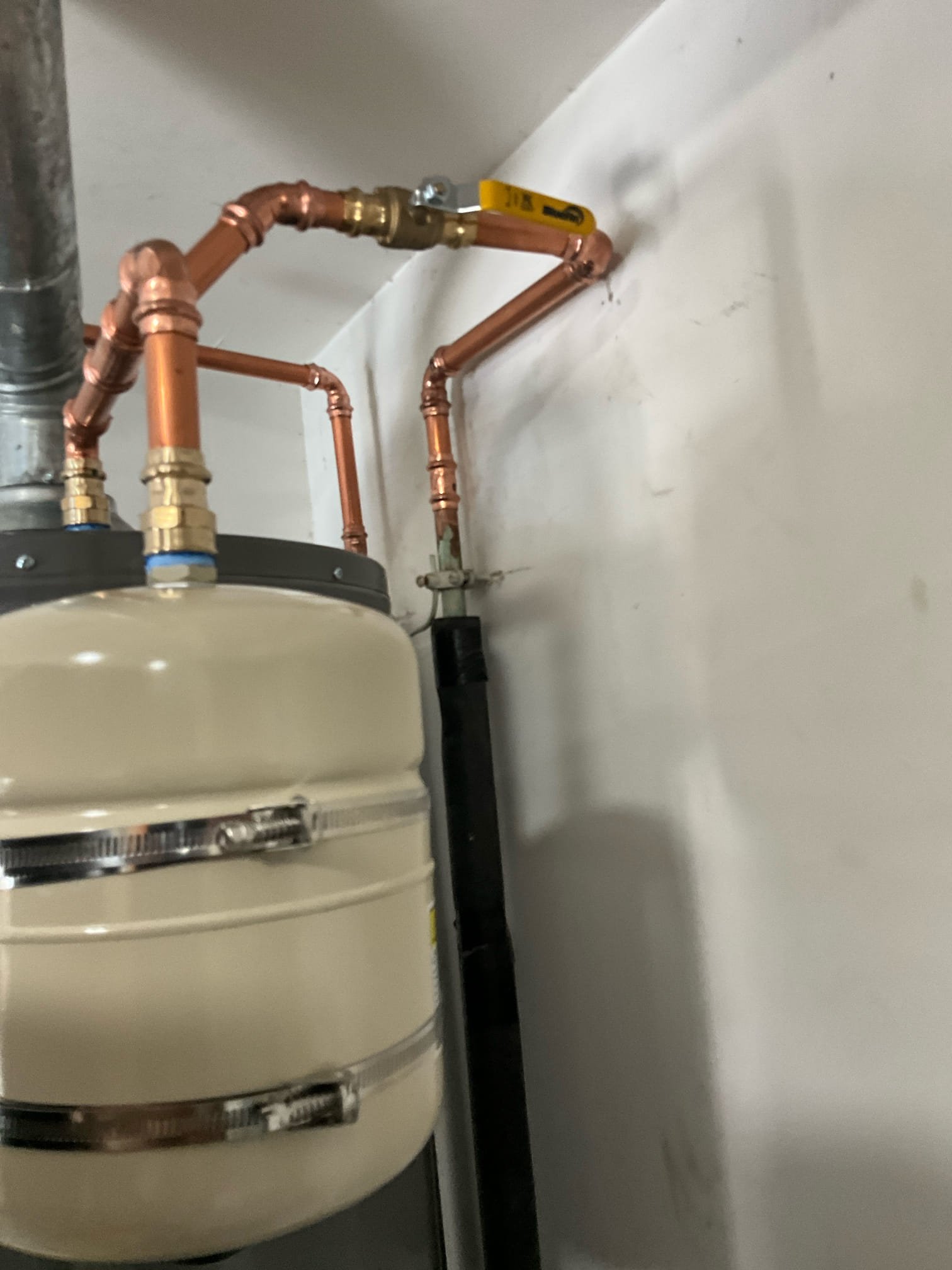 Return to complete quoted work.

Removed water heater and installed new 50 gallon gas water heater. This included the addition of a drip pan, replacing the gas drip leg and gas hose to  fix a gas leak. Installed thermal expansion tank, and new shut off valve. Removed old pressure regulating valve and installed new PRV. 

I checked the water in the home and the volume and pressure is much better than previously reported.

Pressurized system and checked for leaks. Set water heater to standard temperature. Cleaned work space. 