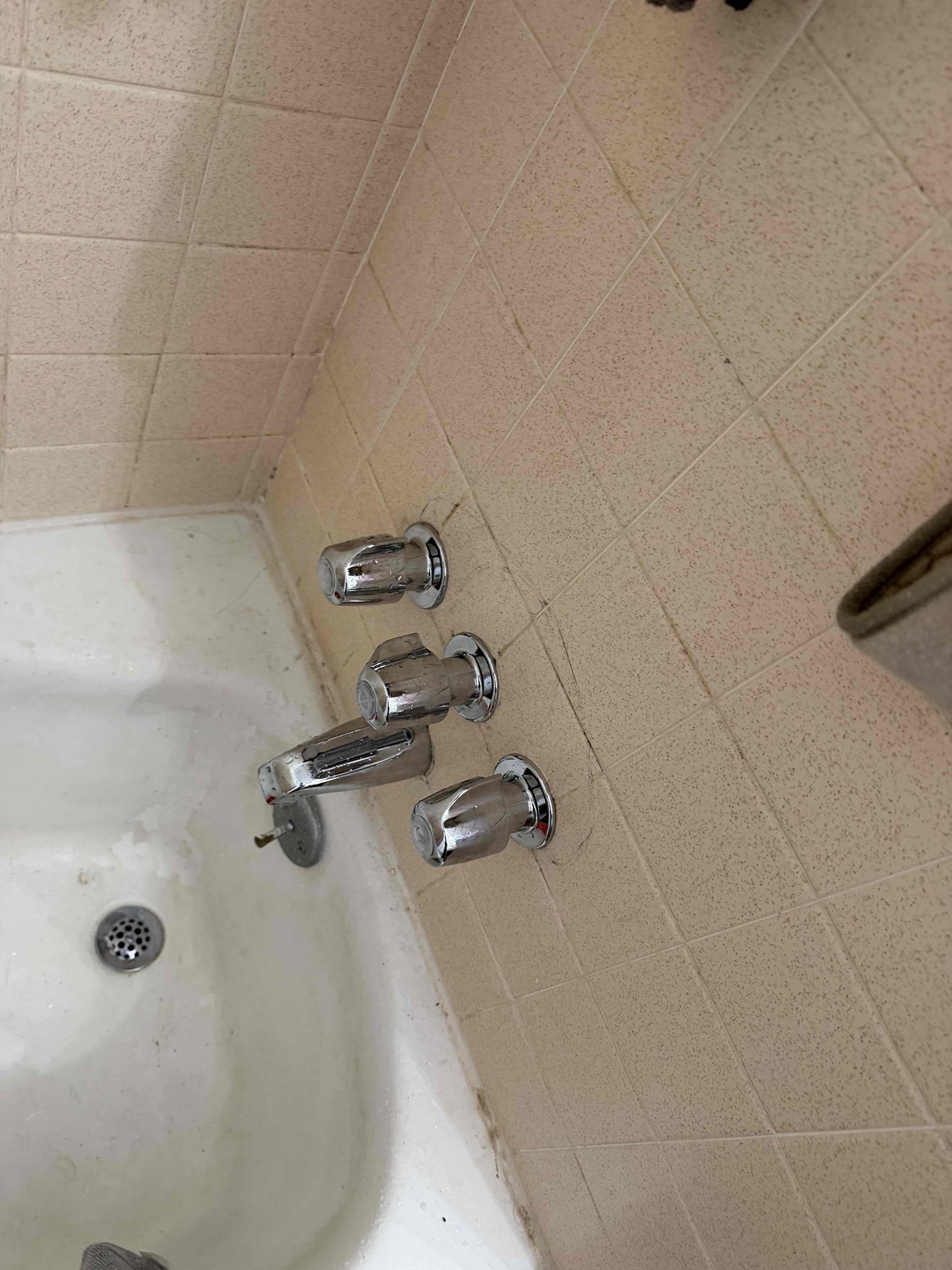 Customer stated that three handle shower valve was dripping. Stated to customer that it would be better to replace then repair and customer agreed. Went ahead and cut out all three handle shower valve. Wanted to originally install single handle shower valve, but with cover plate tub spout will be touching and won’t make proper seal so decided to go back with three handle shower valve. Installed new three handle shower valve and tested. No leaks were present at this time caulked around trim and cleaned up work area. Chen plumbing won’t be responsible for sheet rock repair.