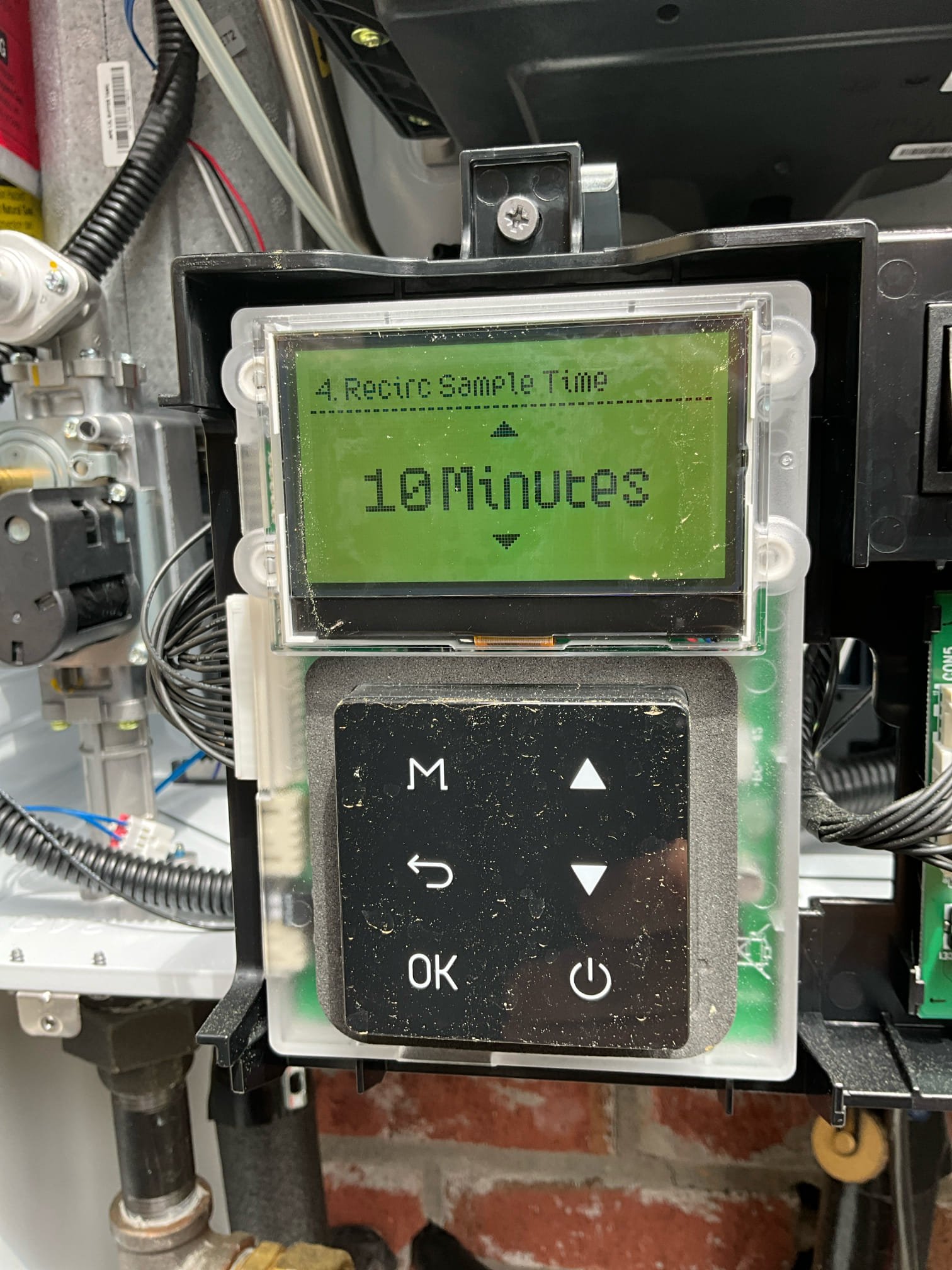 Call for hot water taking too long to heat up.

I met with Ms. Jane and discussed concerns with the hot water. She expressed frustration with the tankless water heater. She states that the hot water takes far too long to arrive at the kitchen faucet, and sometimes does not get very hot.

Our last visit was to replace a defective recirc crossover tee to resolve water hammer and vibrations in the pipes. 

Today I checked water at the kitchen faucet. Although the water did get hot within ~30-45 seconds, Ms. Jane states that the water is not as hot as she would like, and that it normally takes significantly longer to get hot.

At the water heater: No relevant error codes. The only error codes present was from initial start up, and from the vent sensor false alarm during diagnostic tests.

I adjusted the recirculating sample time from 30 minute intervals to 8 minute intervals, and turned up the temperature to the requested 135 degrees.  I inspected the remaining bathrooms and kitchen to ver