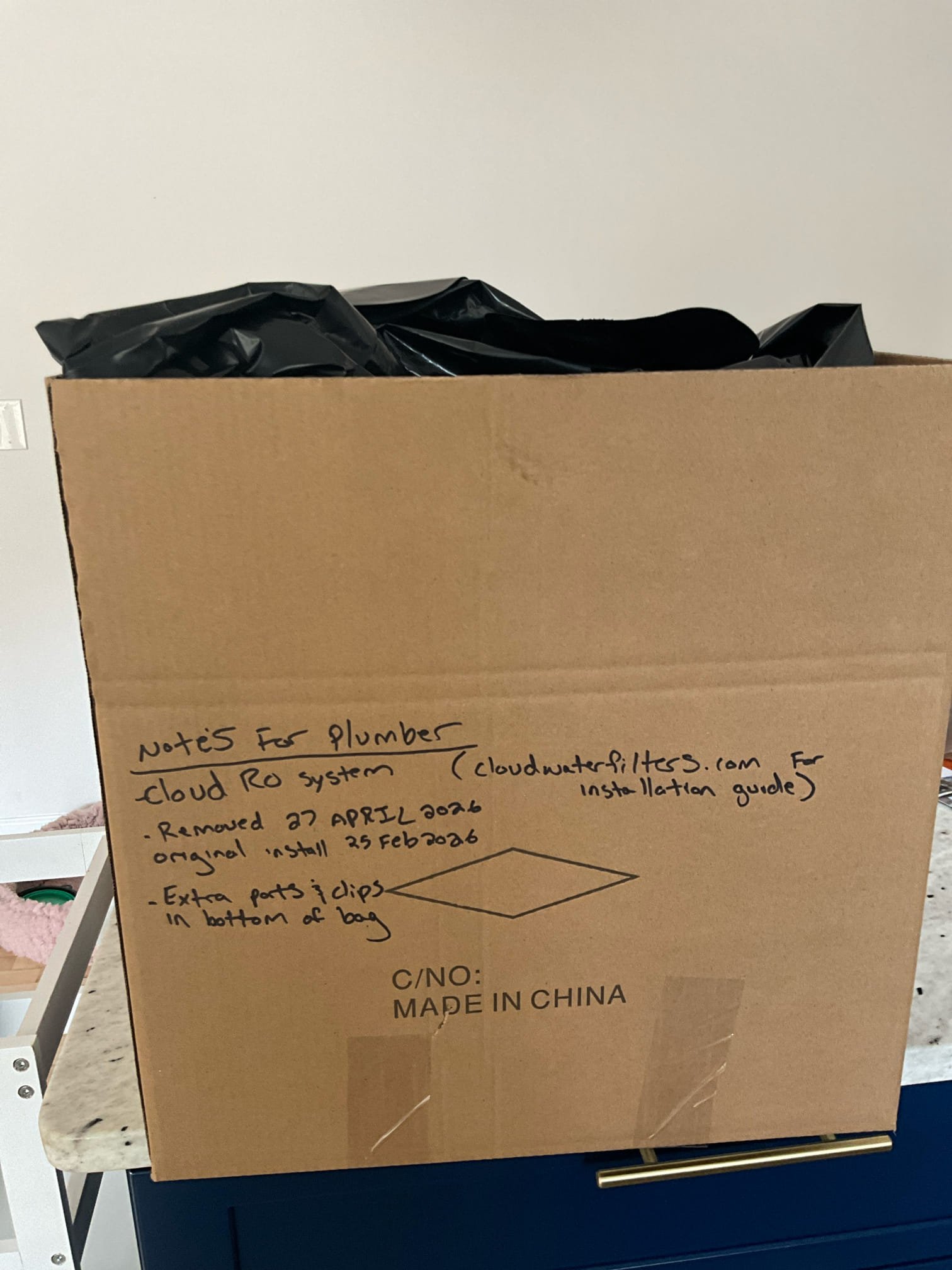 Call to check shower drain and remove RO system.

Met with Alexandra. She is moving this week and would like to remove the RO system that was recently Installed in order to take it with her.

I removed the RO system and put it in a box, including all extra parts and clips (in bottom of box). I do not have a sink hole cover to match the finish of the faucet and soap dispenser. I have shown Alexandra a link for an Amazon purchase, and she has already has other contractors coming in to do work.

For the shower drain, I assessed history of problem, and the drain and cannot find any plumbing issue. The drain does have some hair and drain gunk in it, but is draining and appears to be correctly vented. The shower tile and grout does appear to be deteriorating, which may lead to water under or behind tiles and moisture allowing mildew to accumulate. Alexandra mentioned she has lived here for years, and the smell is a recent issue. Last time we removed hair and gunk, and I did not find any issu