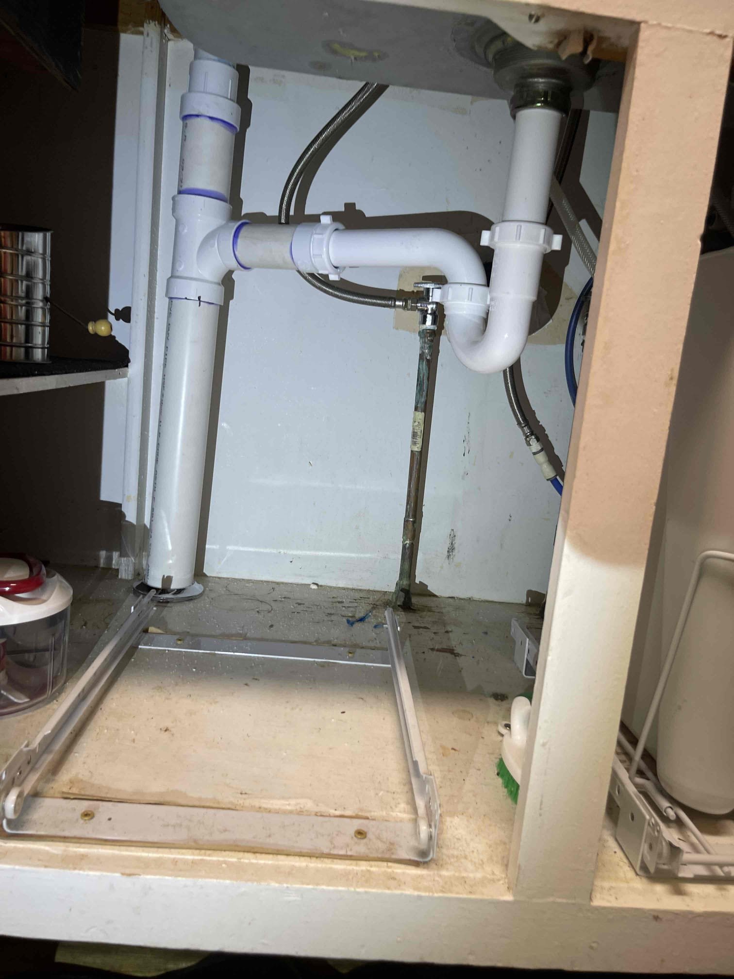 Came out to perform work as quoted. Replaced entire 3” branch line servicing the kitchen/dishwasher. Replaced section of the 4” mainline. Rerouted kitchen drain down through the base of the cabinet. Tested to ensure proper function and a leak free installation. Camera’d the mainline out of the house. We only got the camera to 10-15’ from the house before we hit a pool of water being held up in the pipe that I believe may be due to a root intrusion base on the proximity to the very large tree in the front yard. Left estimate to install a two way cleanout and jet the line. 