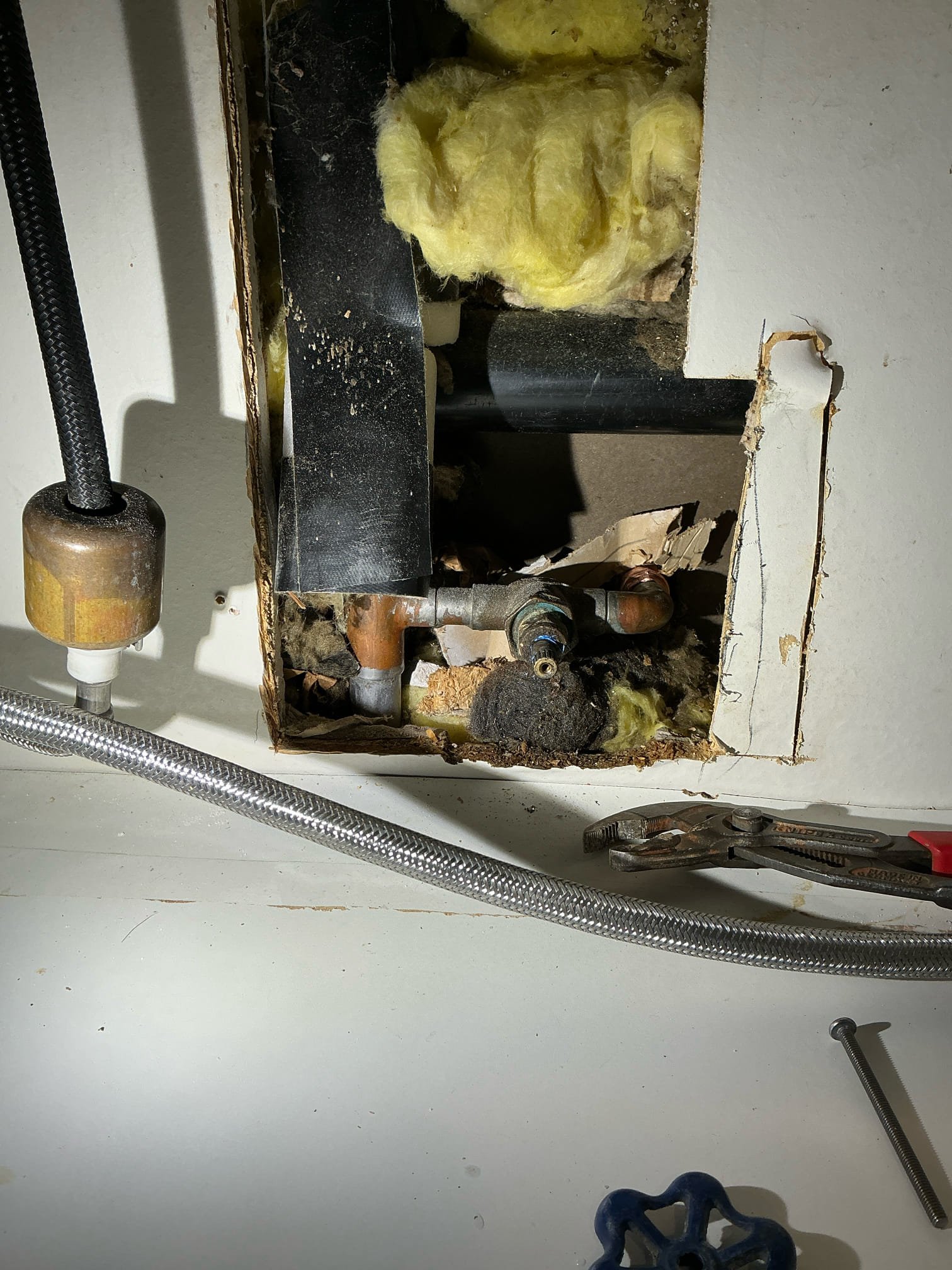 Customer called us out for water showing up behind sheet rock. Were previous work was after initial evaluation. We found gate valve packing to be leaking unrelated to any work that we did fixed gate valve for customer informed next time replacement was necessary. Customer understands.