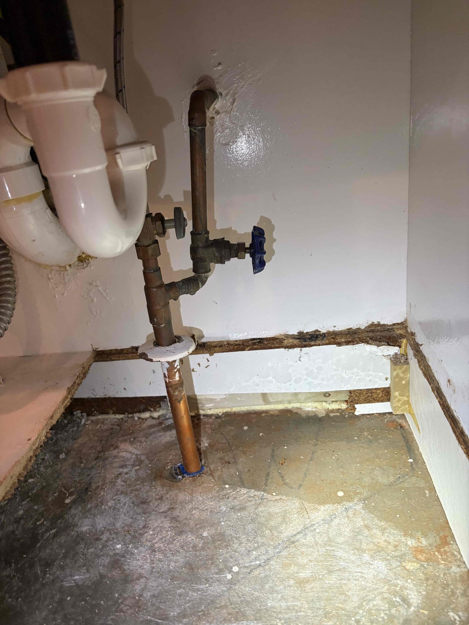 For this customer, they have a leak on the cold waterline right up against the slab in the copper pipe, in order to properly fix the copper piping. We will have to remove concrete by chipping it out and jackhammering the floor in order to properly repair. The section of copper piping is a very small hole, but it created a lot of damage. I have referred to customers who are water restoration partner. In addition to that his water heater is from 1997, recommended replacement on that unit however the main priority is getting his water back onto the house. Give him a few options of what we could get started today however, the customer wants to shop around and get different estimates for this type of repair I had drawn a sharpie of where I would start my cut into the slab. For the proper fix. The customer wanted to just put a bit of solder on the hole to see if that would fix the solution. However, I had mentioned to the customer that we do not do temporary or Band-Aid repairs and that woul